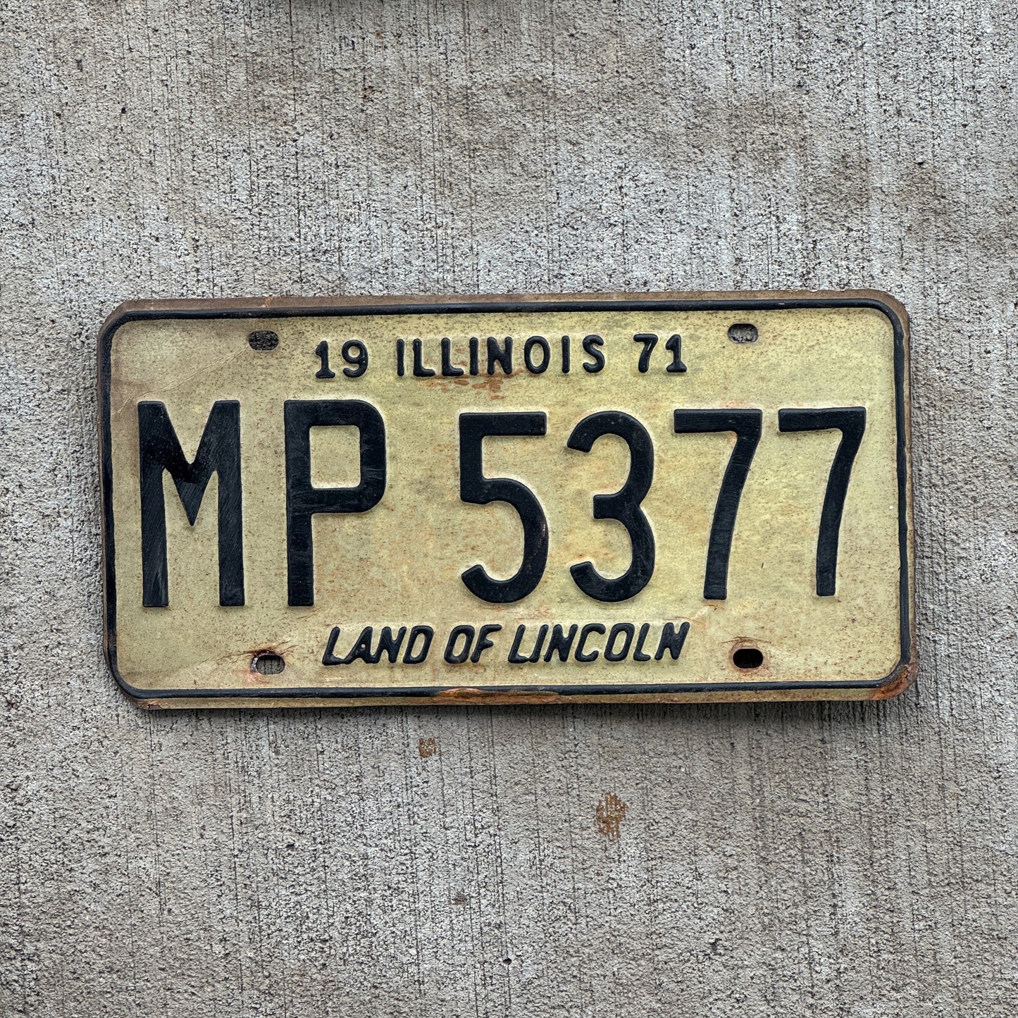 Photo of a 1971 Illinois Truck Mileage Tax License Plate Auto Tag 2 Vintage Garage MP 5377 with original patina