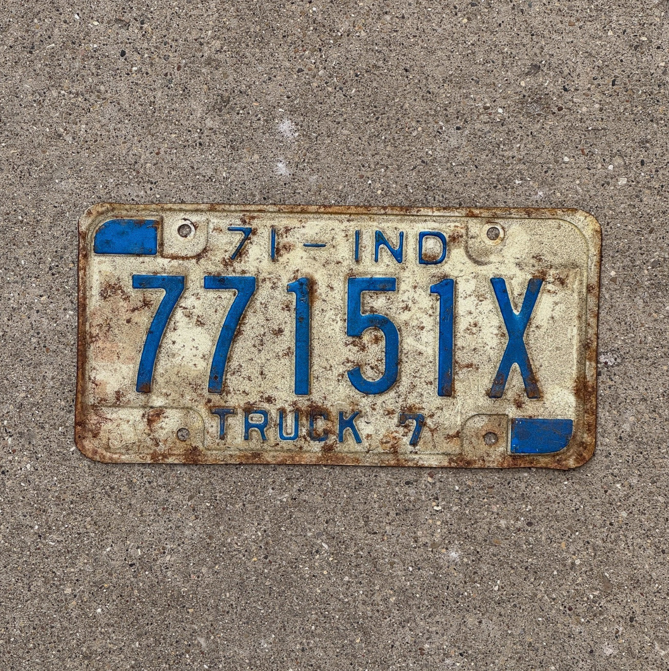 Photo of a 1971 Indiana Truck License Plate Auto Tag Garage Decor 77151 X