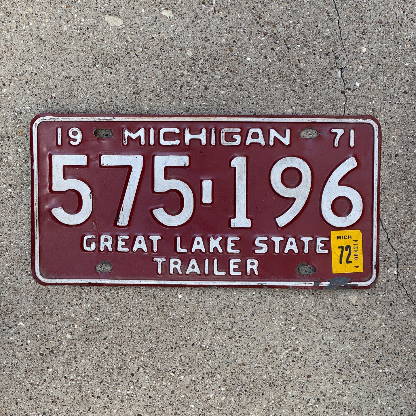 Photo of a 1971 Michigan Trailer License Plate Auto Tag Garage Decor Vintage 575 196