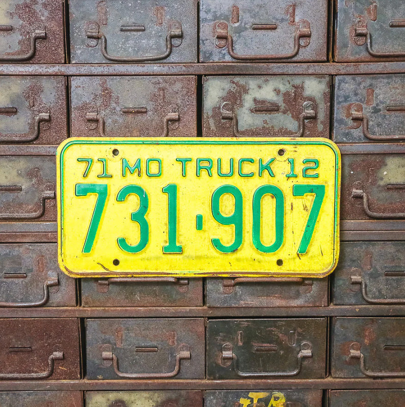 Photo of a 1971 Missouri Truck License Plate Auto Tag Garage Decor Vintage 731 907 with original patina