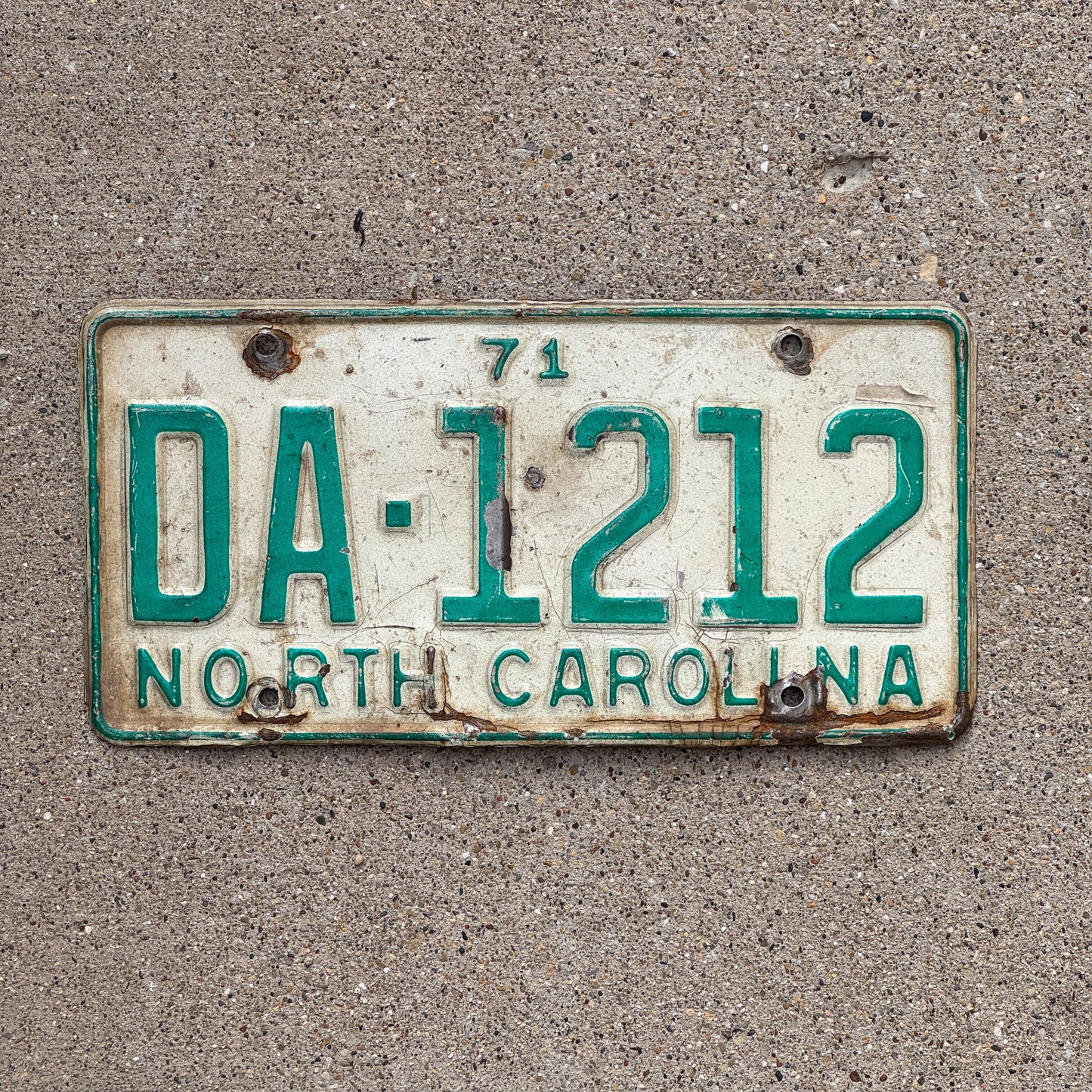 Photo of a 1971 North Carolina License Plate Auto Tag Garage Decor Vintage DA 1212 with original patina