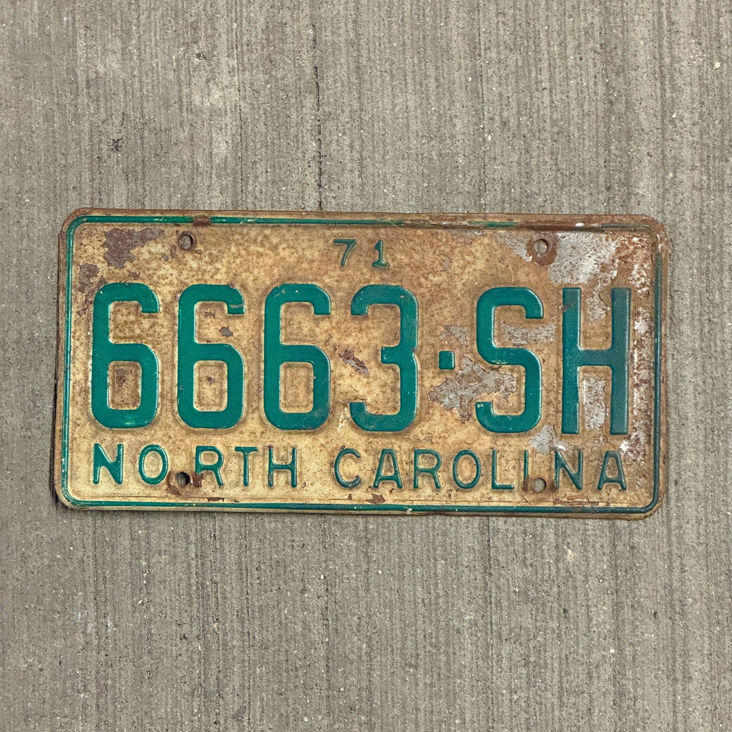 Photo of a 1971 North Carolina Truck License Plate Auto Tag Garage Decor Vintage 666 Devil Evil Repeating 6663 SH with original patina