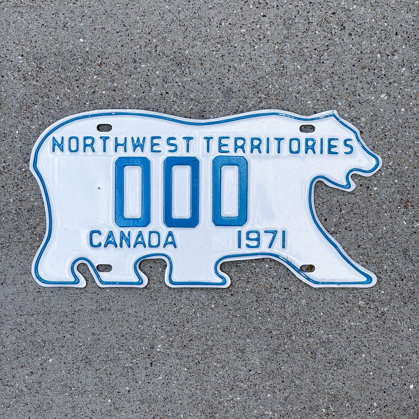Photo of a 1971 Northwest Territories Sample License Plate Auto Tag Garage Decor Vintage Polar Bear 000