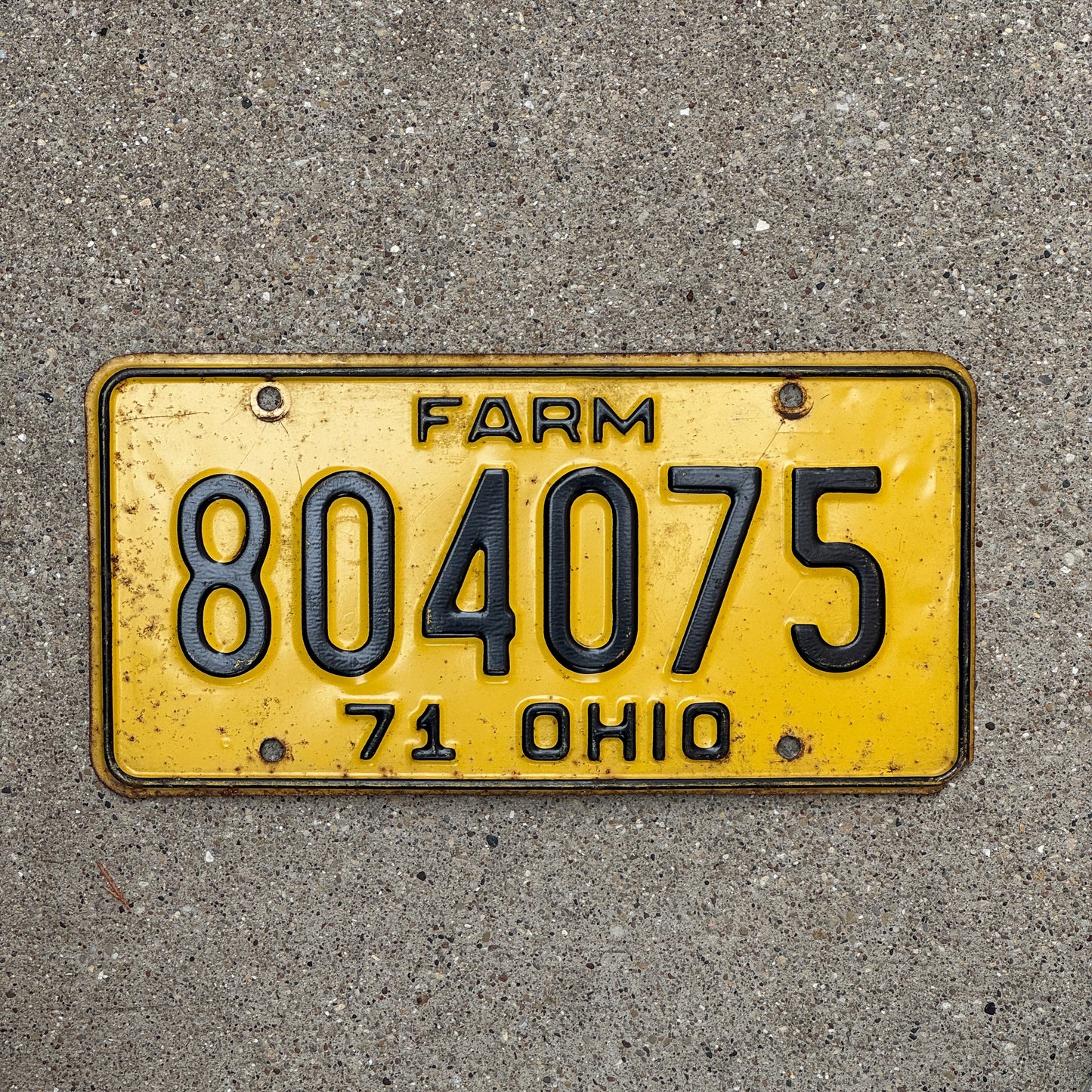 Photo of a 1971 Ohio Farm License Plate Auto Tag Garage Decor Vintage 804075 with original patina