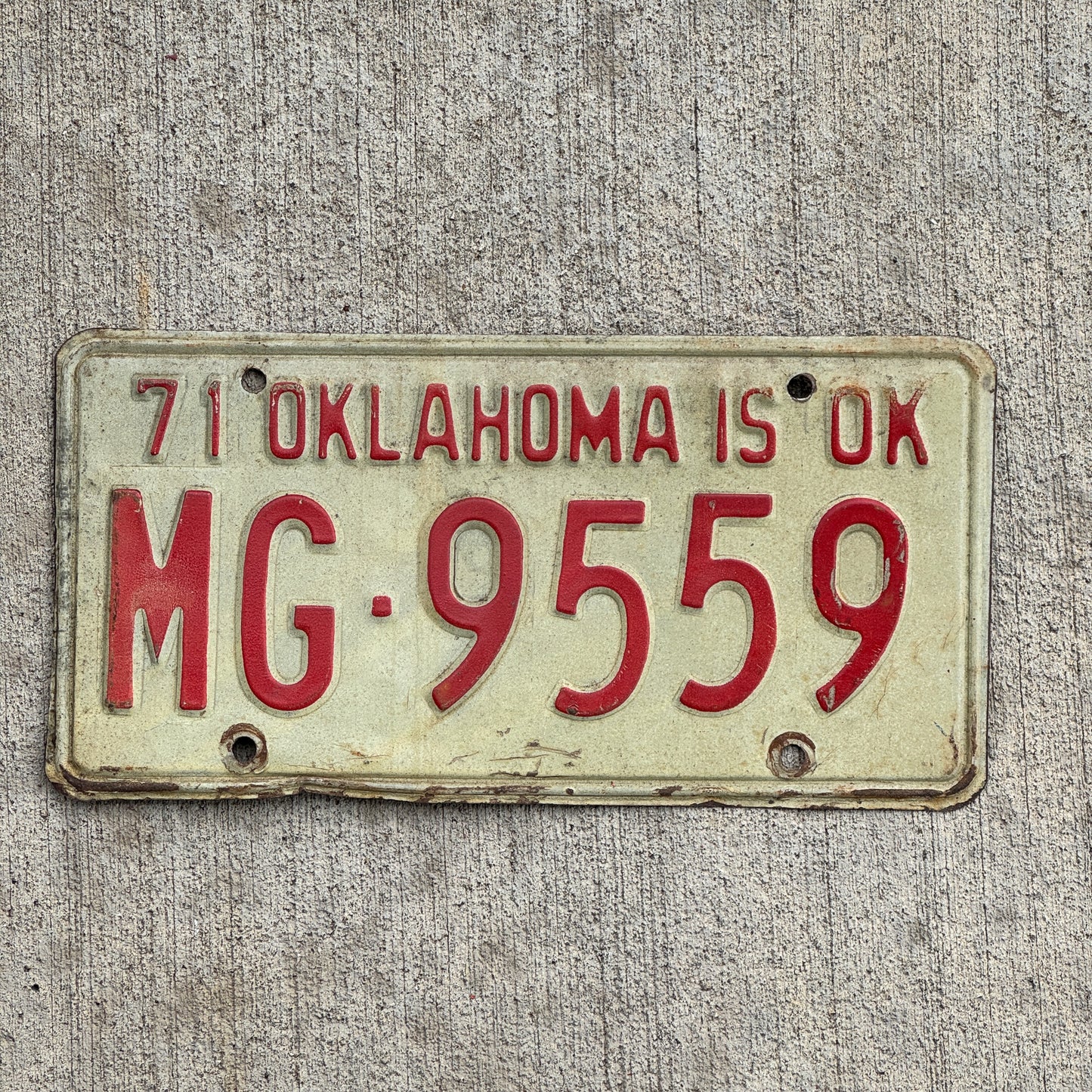 Photo of a 1971 Oklahoma License Plate Auto Tag Garage Decor Vintage Palindrome MG 9559 with original patina