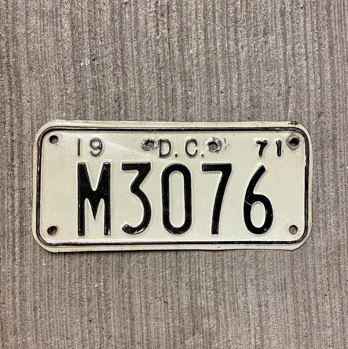 Photo of a 1971 Washington DC Motorcycle License Plate Auto Tag Garage Decor Vintage M 3076 with original patina