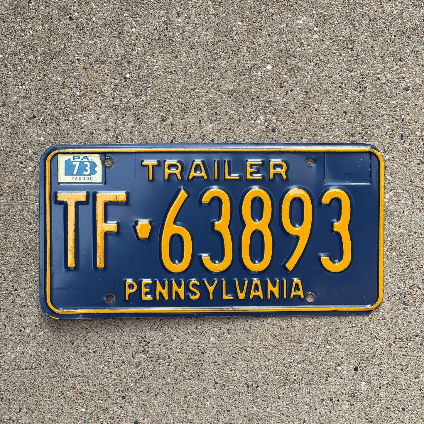 Photo of a 1972 1973 Pennsylvania Trailer License Plate Auto Tag Garage Decor Vintage TF 63893 with original patina
