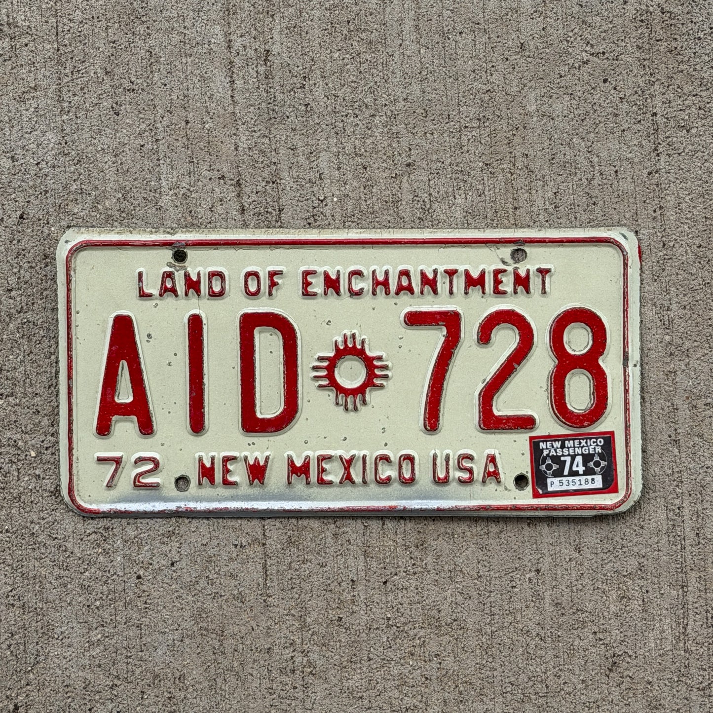 Photo of a 1972 1974 New Mexico License Plate Auto Tag Garage Decor Vintage AID 728 with original patina