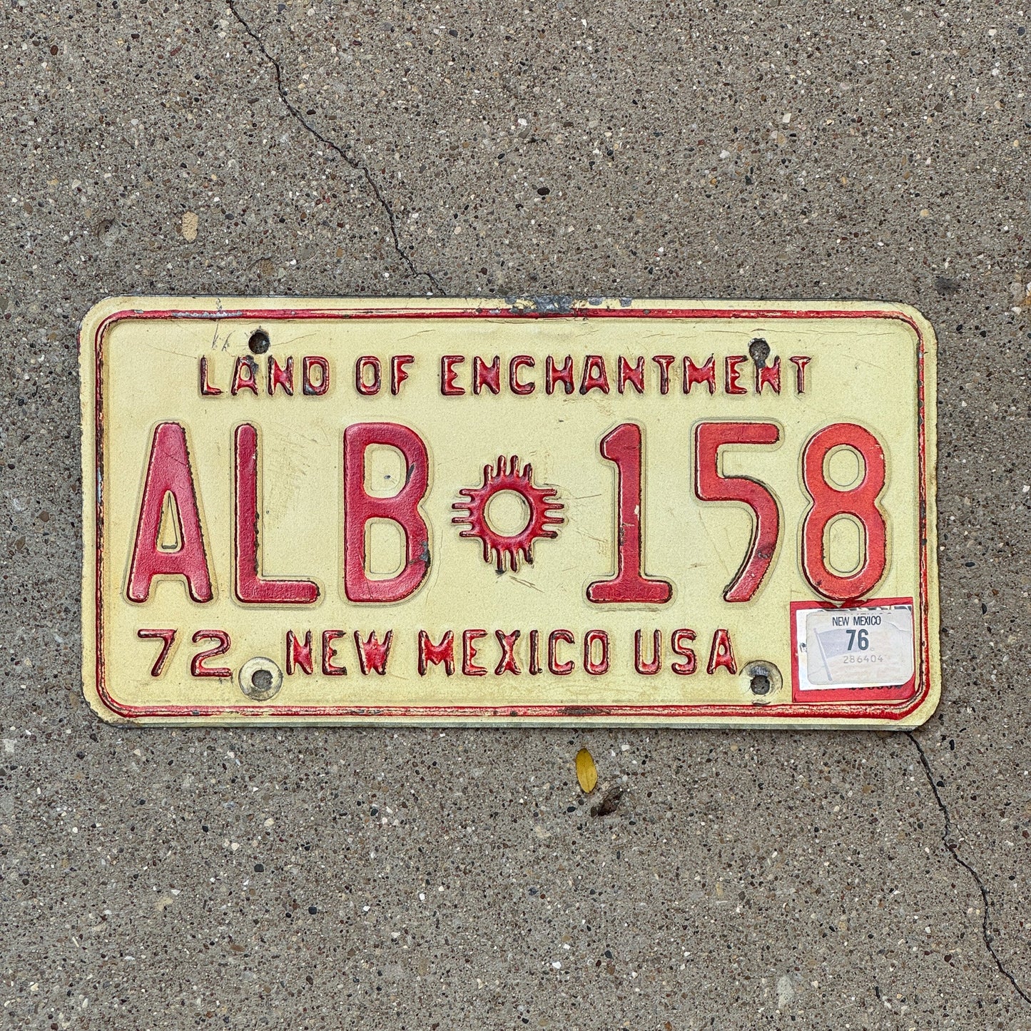 Photo of a 1972 1976 New Mexico License Plate Auto Tag Garage Decor Vintage ALB 158 with original patina