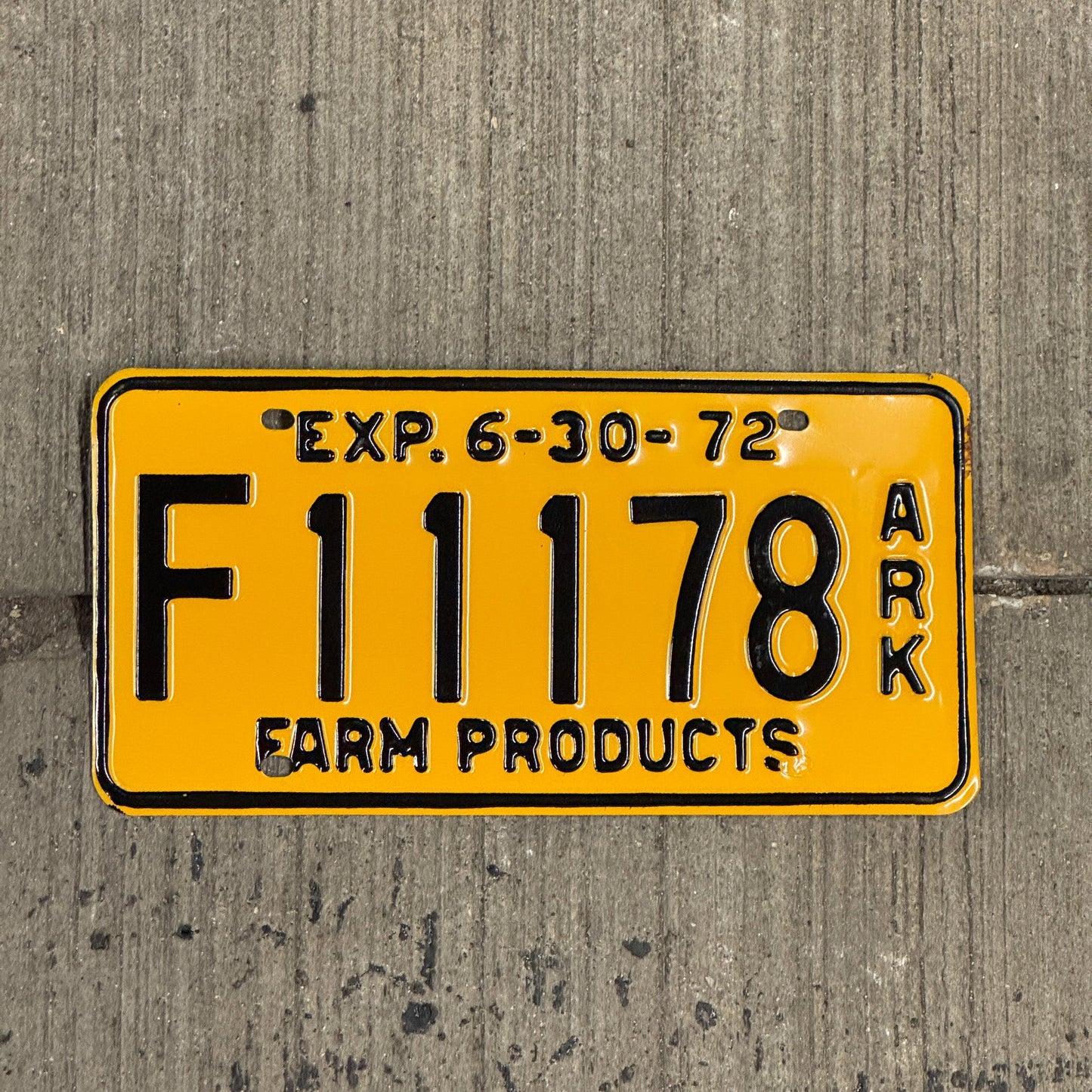 Photo of a 1972 Arkansas Farm Products License Plate Auto Tag Garage Decor Vintage Repeat Repeating F 111 78