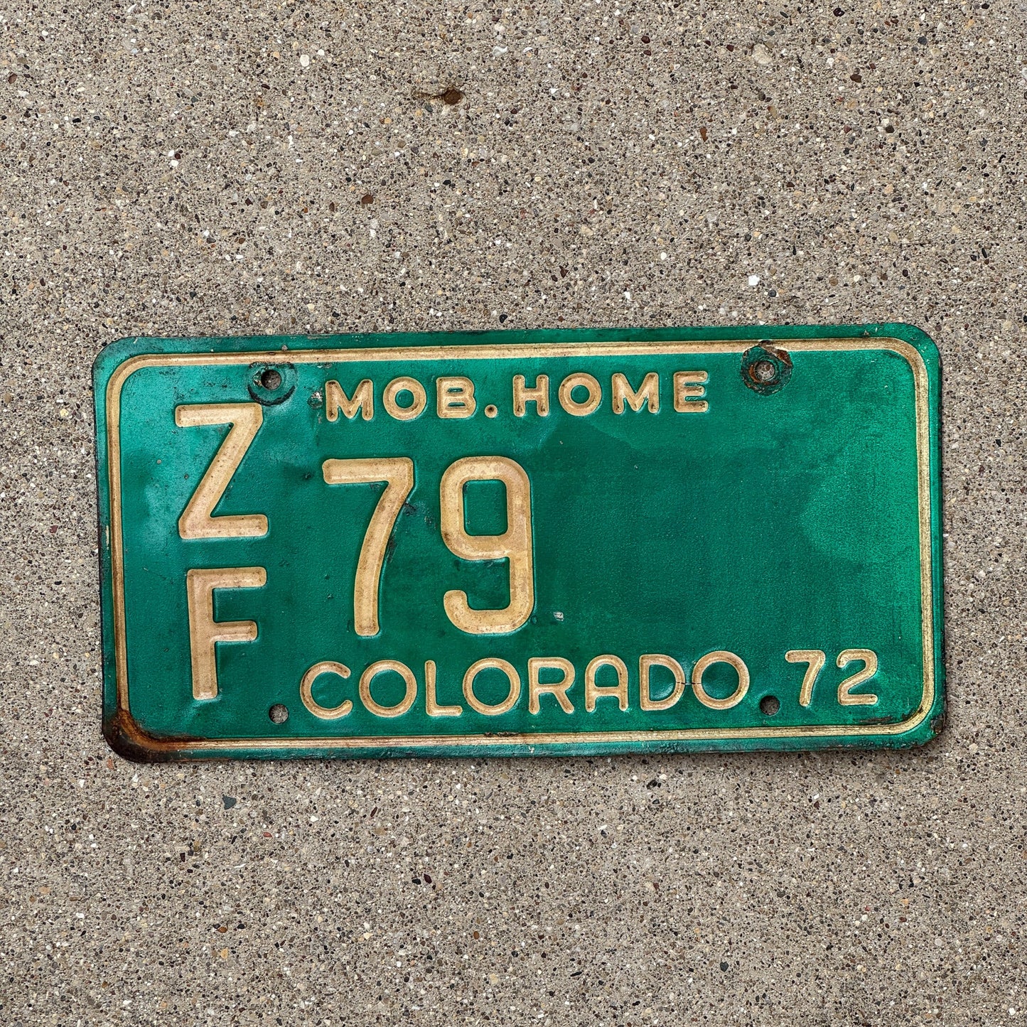 Photo of a 1972 Colorado Mobile Home License Plate Auto Tag Garage Decor Vintage ZF 79