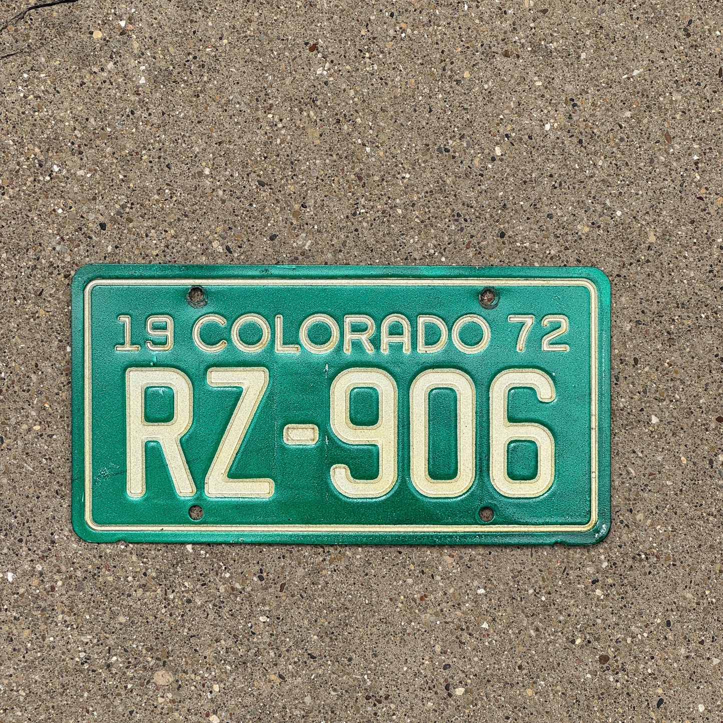 Photo of a 1972 Colorado Motorcycle License Plate Auto Tag Garage Decor Vintage RZ 906