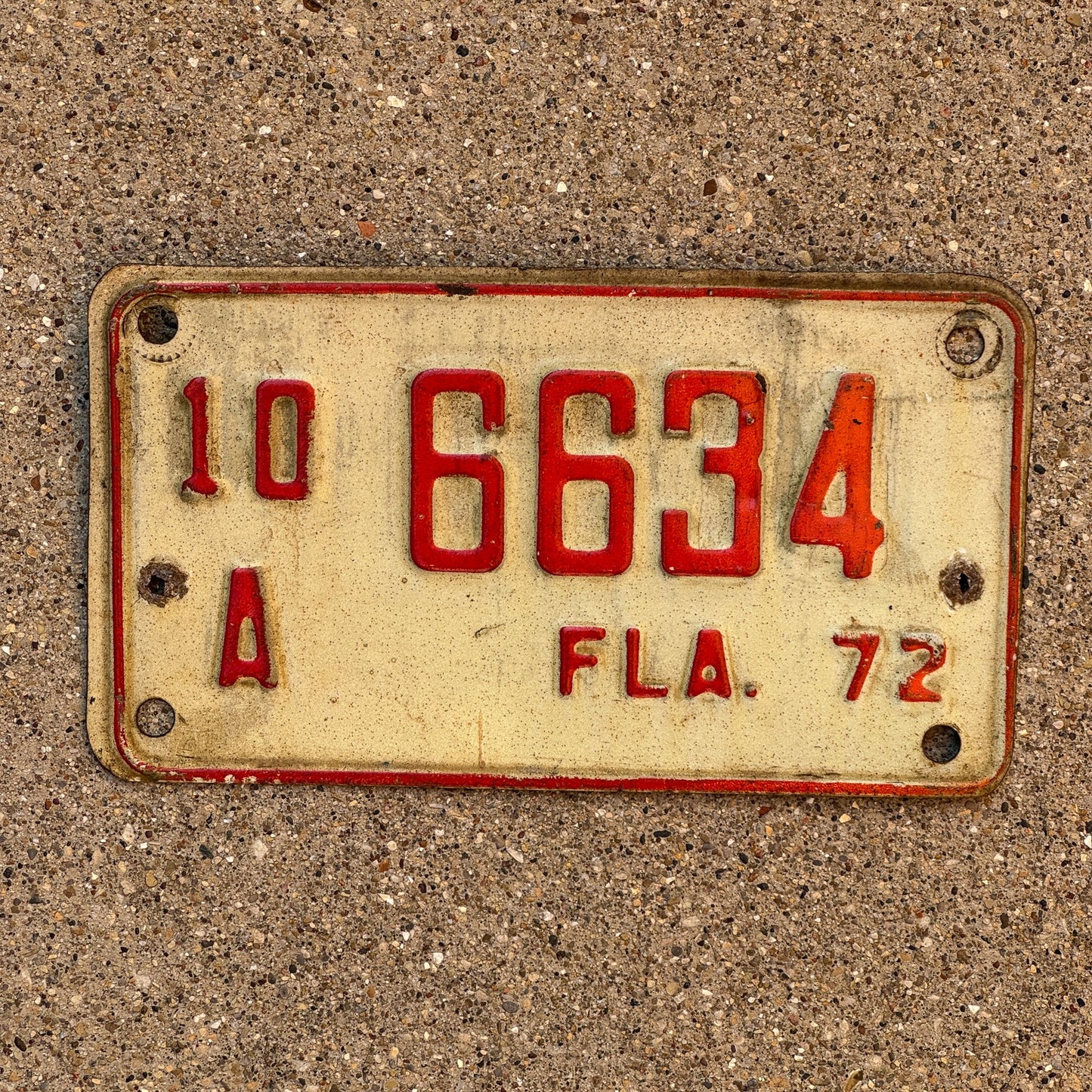Photo of a 1972 Florida Motorcycle License Plate Auto Tag Garage Decor Vintage YOM DMV Clear 10 A 6634