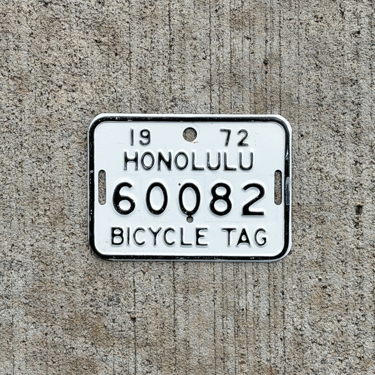 Photo of a 1972 Honolulu Hawaii Bicycle License Plate Auto Tag Garage Decor Vintage Bike 60082 with original patina