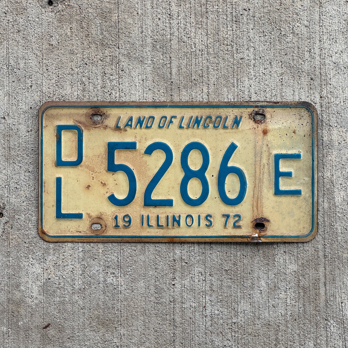 Photo of a 1972 Illinois Dealer License Plate Auto Tag 1 Vintage Garage 5286 E with original patina