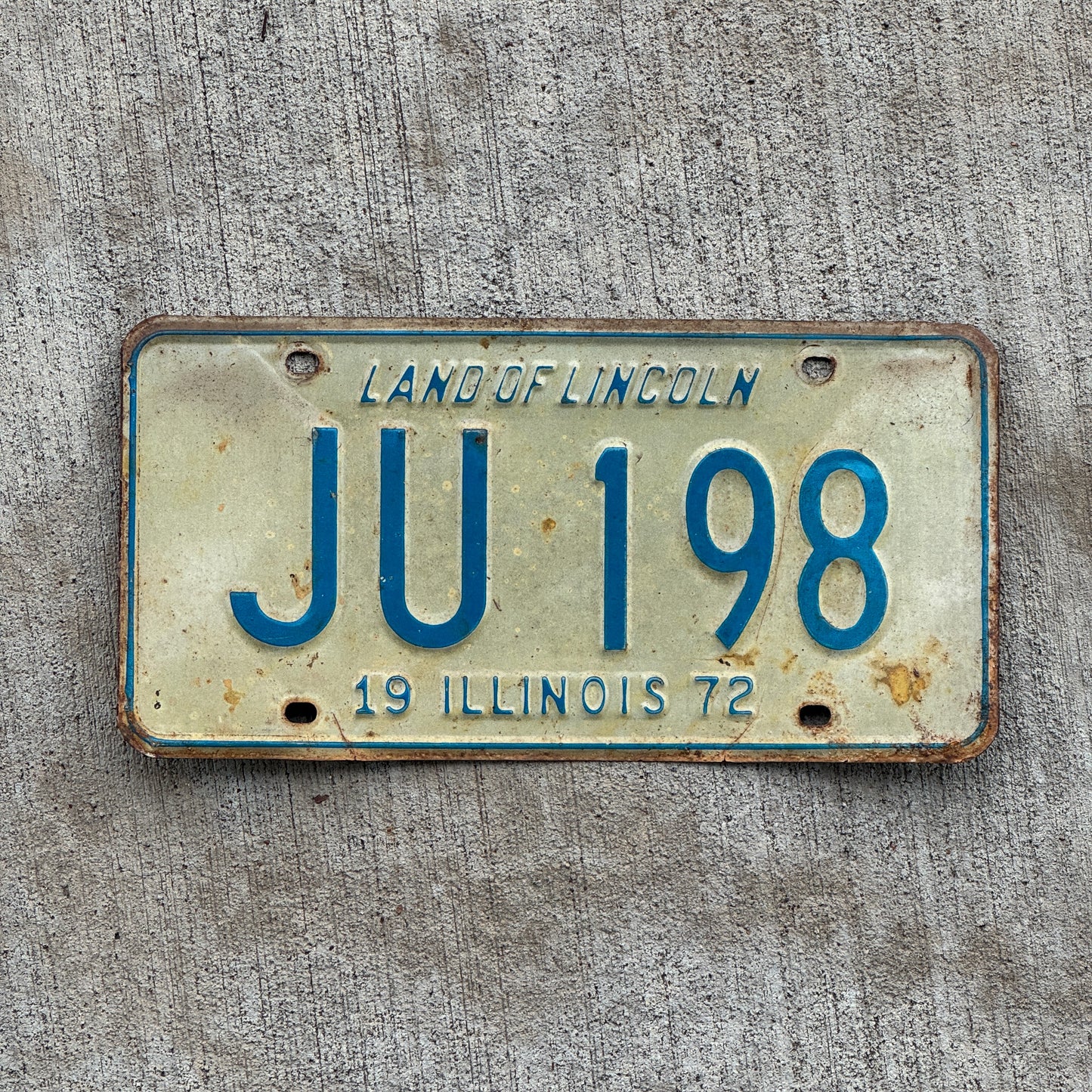 Photo of a 1972 Illinois License Plate Auto Tag 2 Vintage Garage JU 198 with original patina