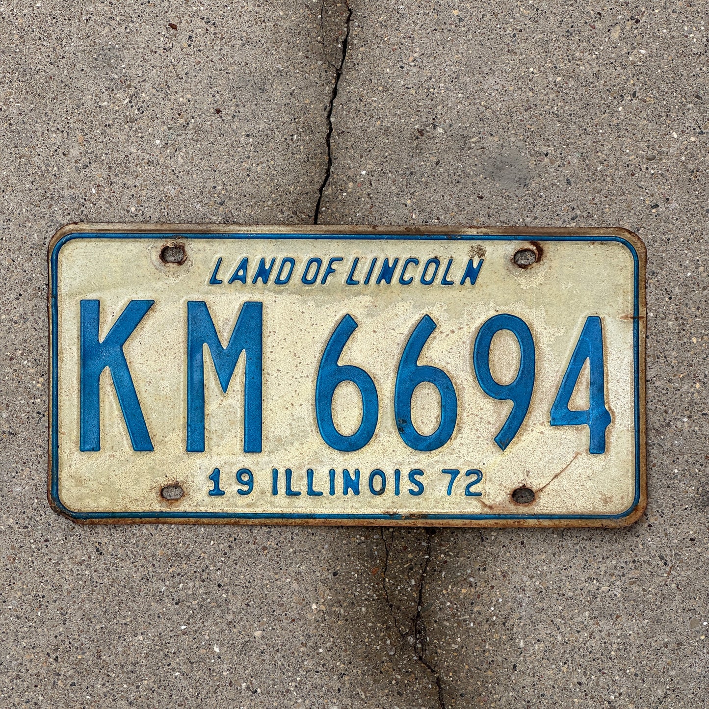 Photo of a 1972 Illinois License Plate Auto Tag Garage Decor Vintage KM 6694 with original patina