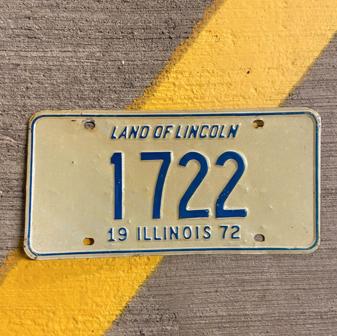 Photo of a 1972 Illinois License Plate Auto Tag Garage Decor Vintage Low Number Four Digit 1722 with original patina