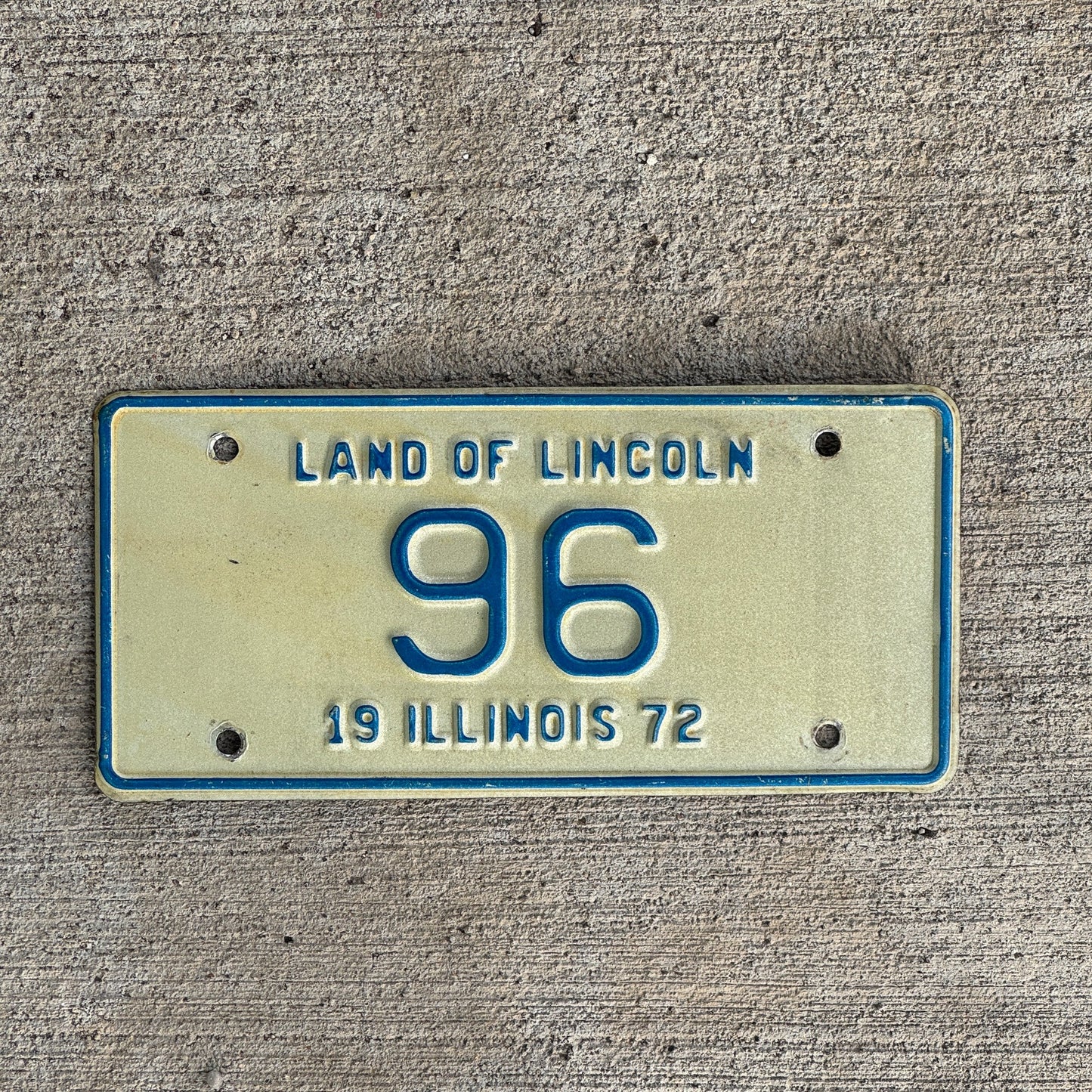 Photo of a 1972 Illinois Motorcycle License Plate Auto Tag Garage Decor Vintage Low Number Two Digit 96 with original patina