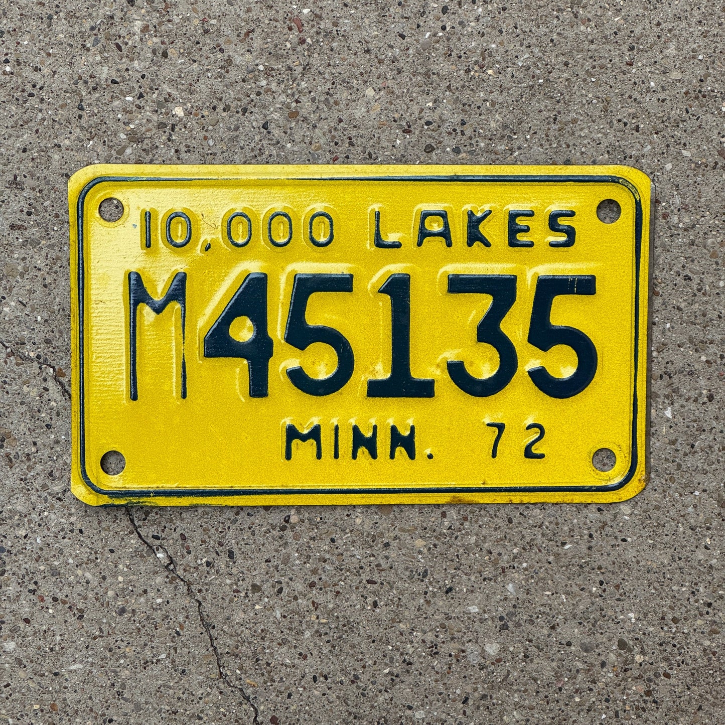 Photo of a 1972 Minnesota Motorcycle License Plate Auto Tag Garage Decor Vintage M 45135 with original patina