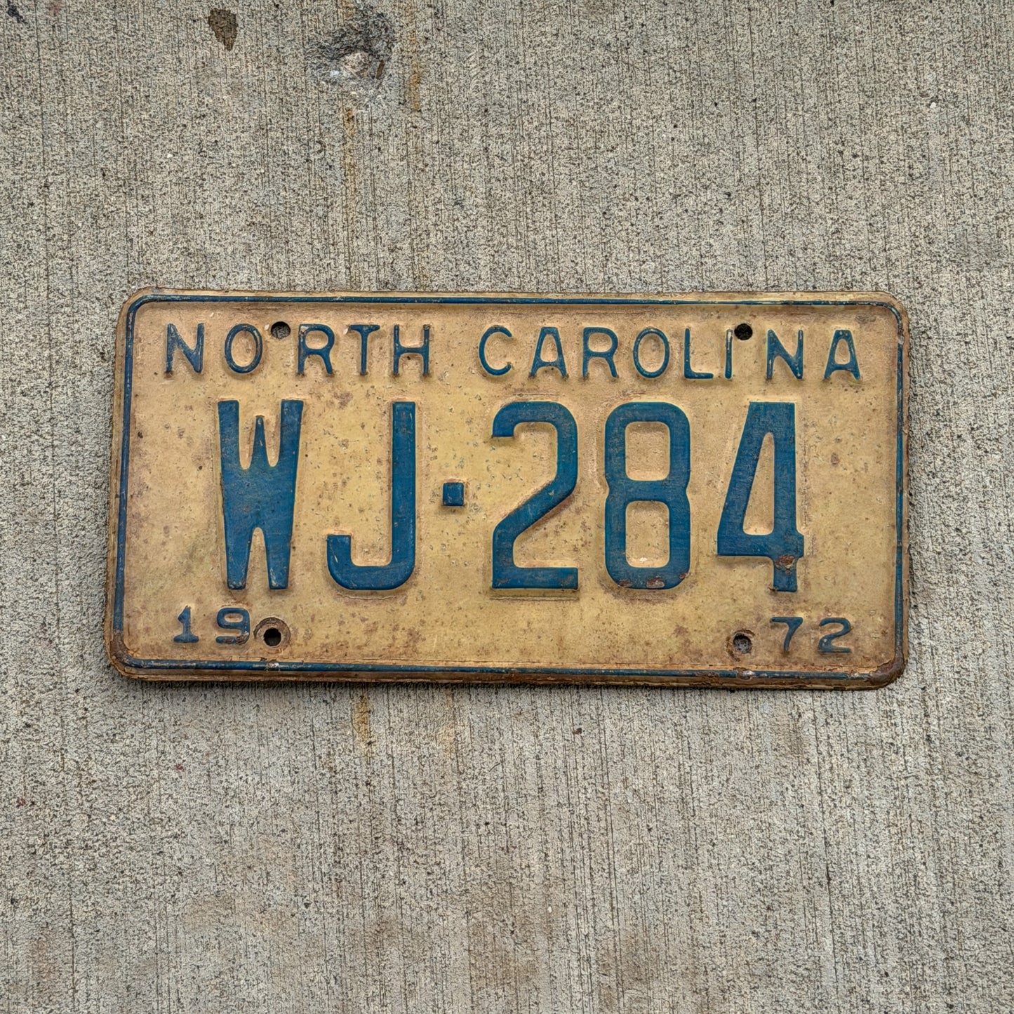 Photo of a 1972 North Carolina License Plate Auto Tag Garage Decor Vintage WJ 284 with original patina