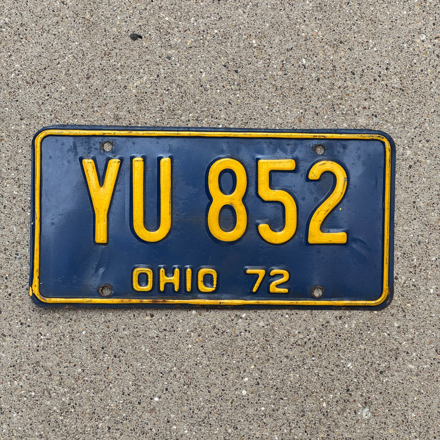 Photo of a 1972 Ohio License Plate Auto Tag Garage Decor Vintage YU 852 with original patina