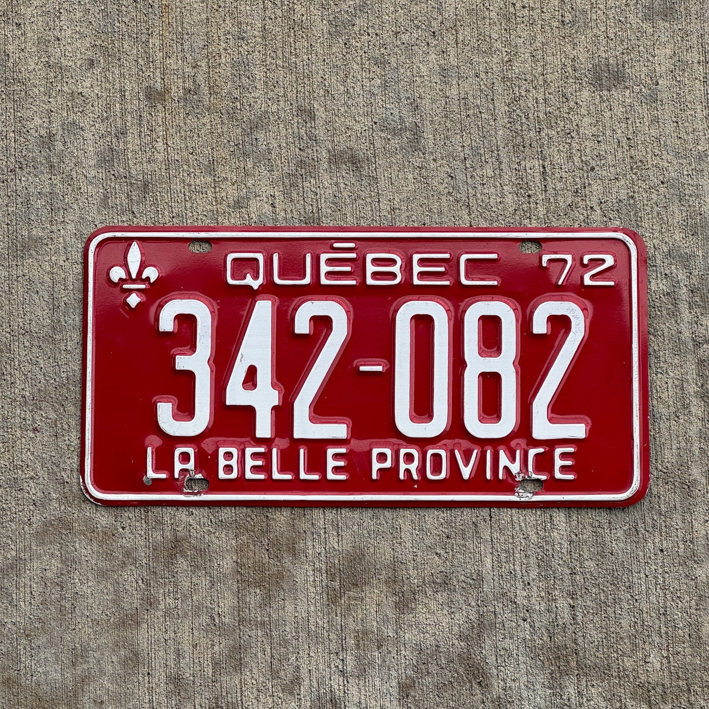 Photo of a 1972 Quebec License Plate Auto Tag Garage Decor Vintage 342 082 with original patina