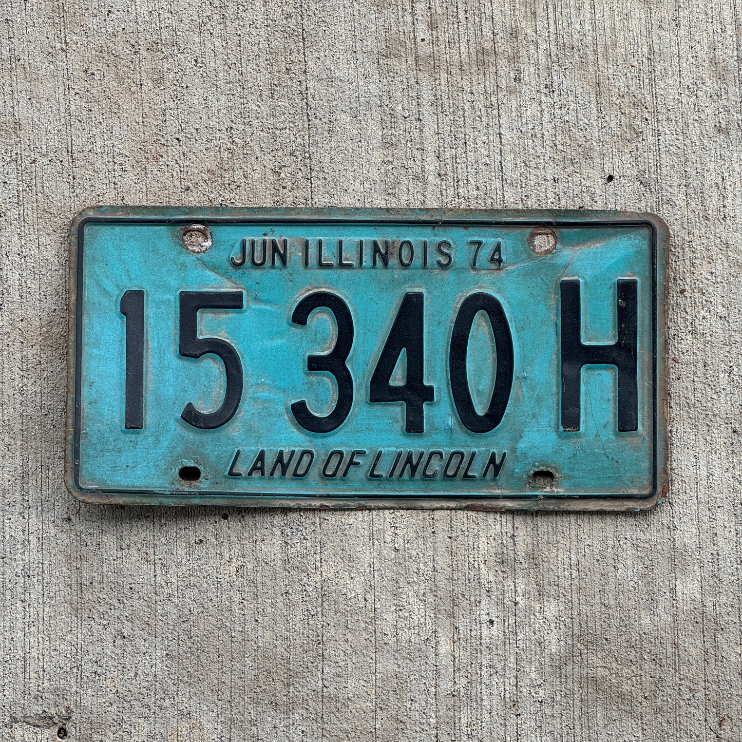 Photo of a 1973 1974 Illinois Truck License Plate Auto Tag 1 Vintage Garage 15 340 H with original patina