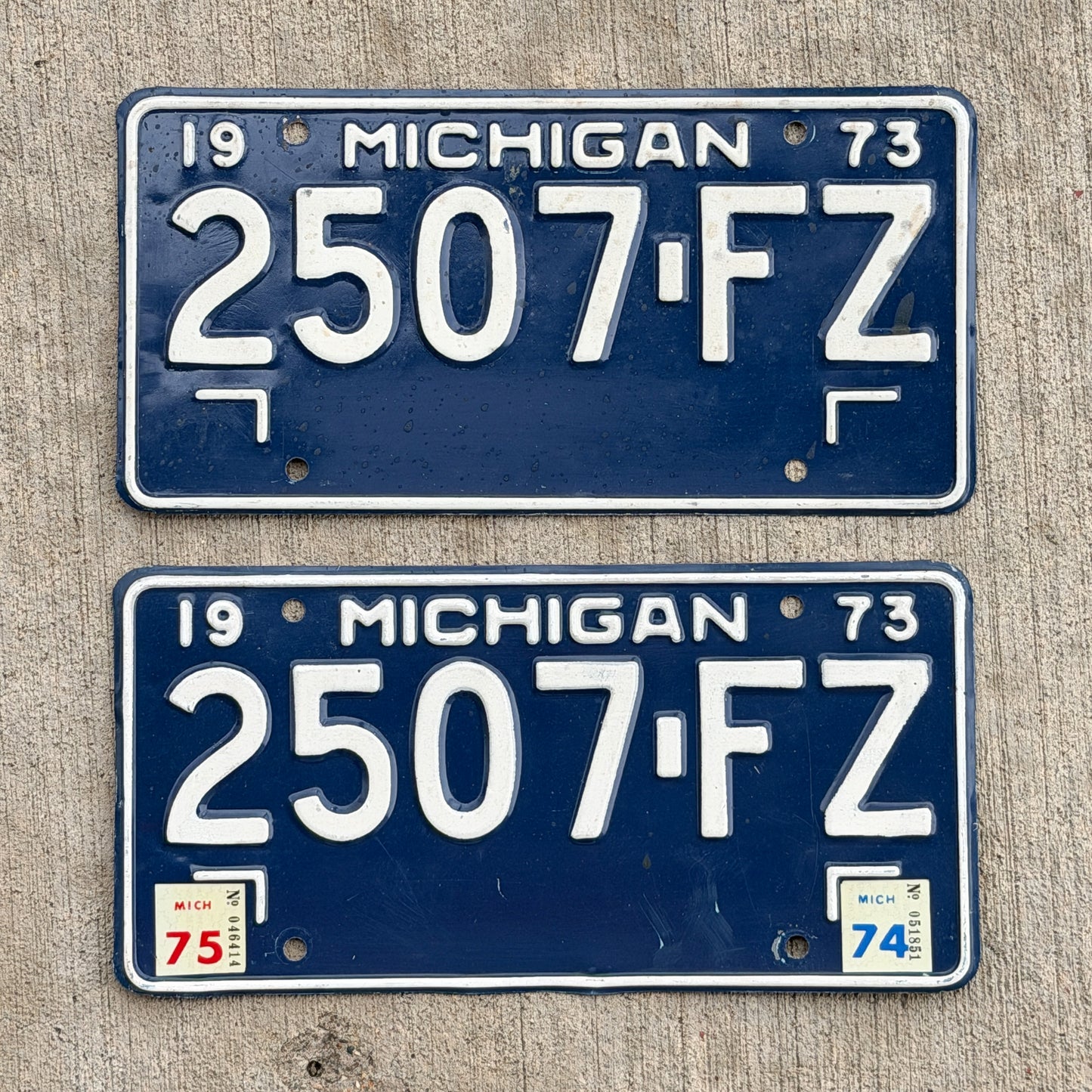 Photo of a 1973 1974 Michigan Commercial License Plate Pair Auto Tag Garage Decor Vintage 2507 FZ with original patina