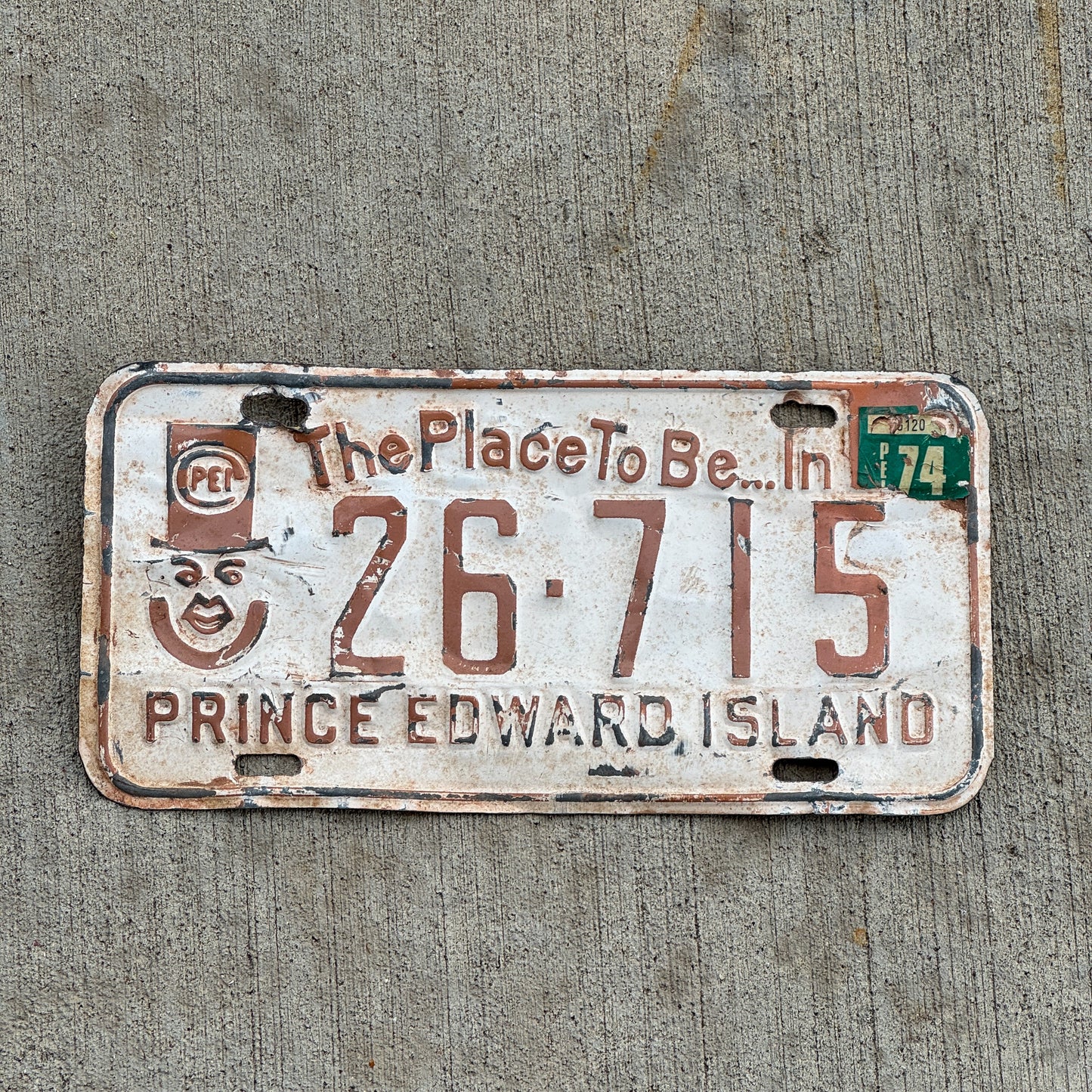 Photo of a 1973 1974 Prince Edward Island License Plate Auto Tag Garage Decor Vintage PEI Father of Confederation Graphic 26 715 with original patina