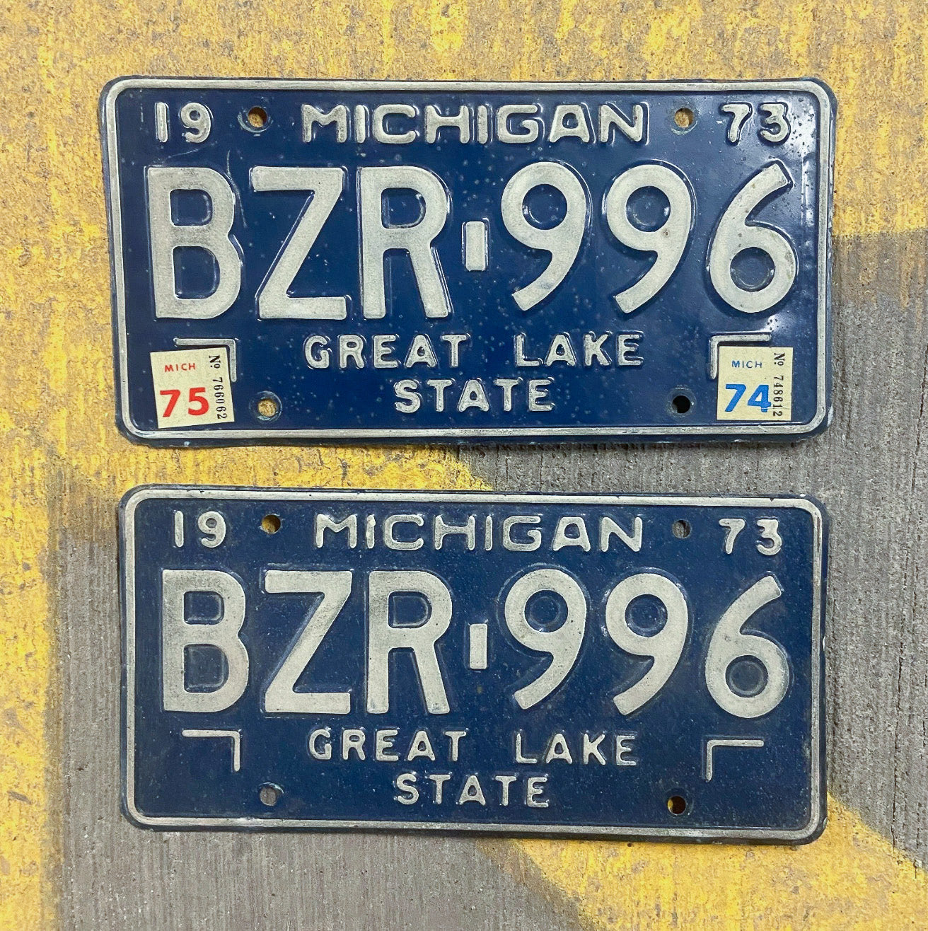 Photo of a 1973 1975 Michigan License Plate Pair Auto Tag Garage Decor Vintage BZR 996 with original patina