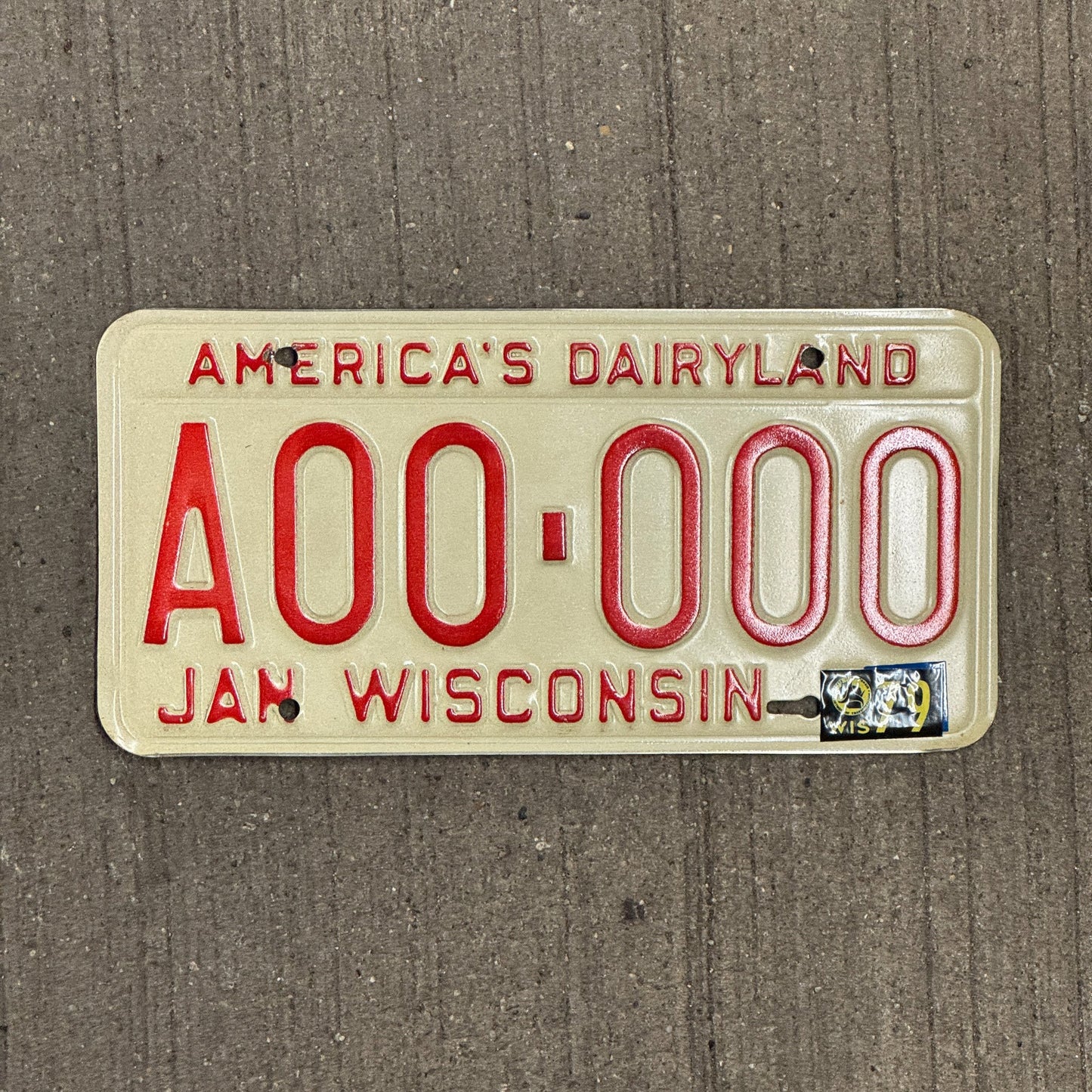 Photo of a 1973 1979 Wisconsin SAMPLE License Plate Auto Tag Garage Decor Vintage A00 000