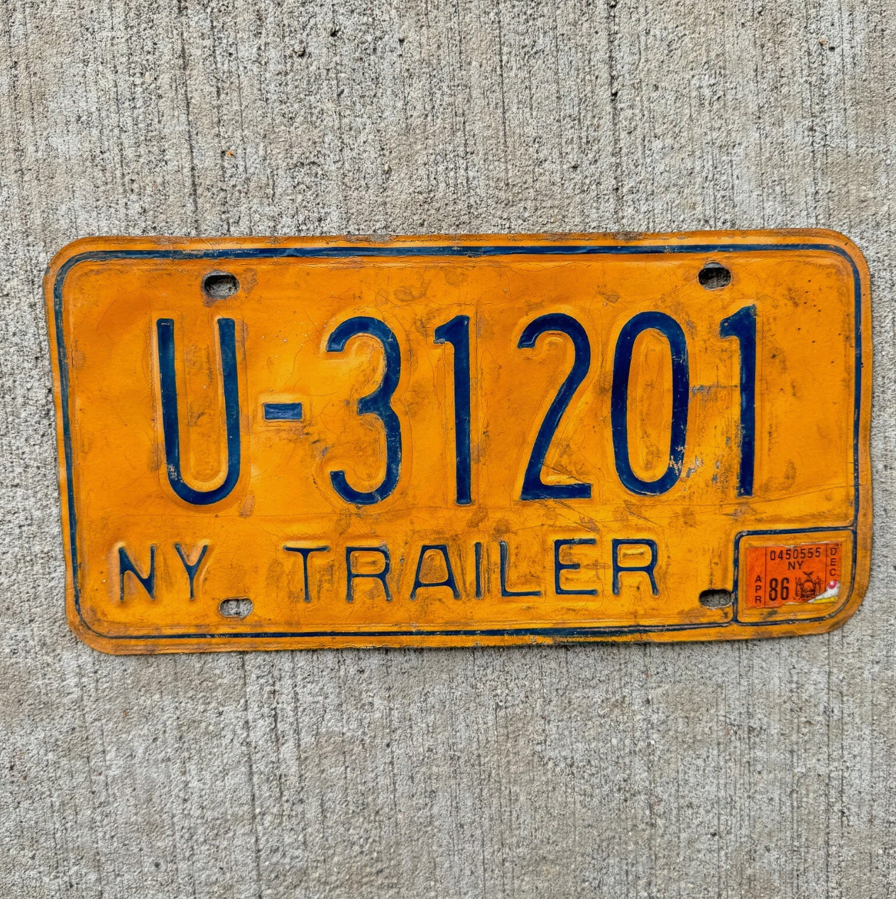 Photo of a 1973 1986 New York Trailer License Plate Auto Tag Garage Decor Vintage Orange U 31201