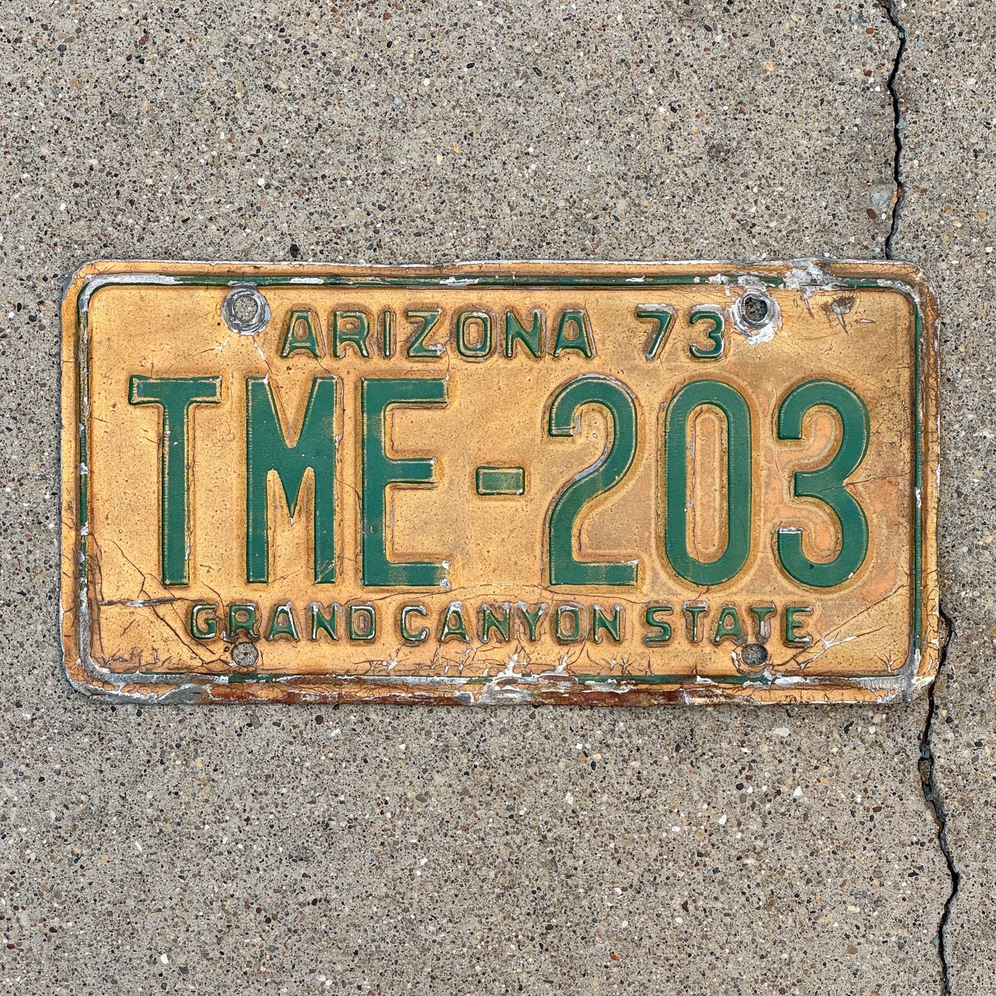 Photo of a 1973 Arizona License Plate Auto Tag Garage Decor Vintage TME 203 with original patina