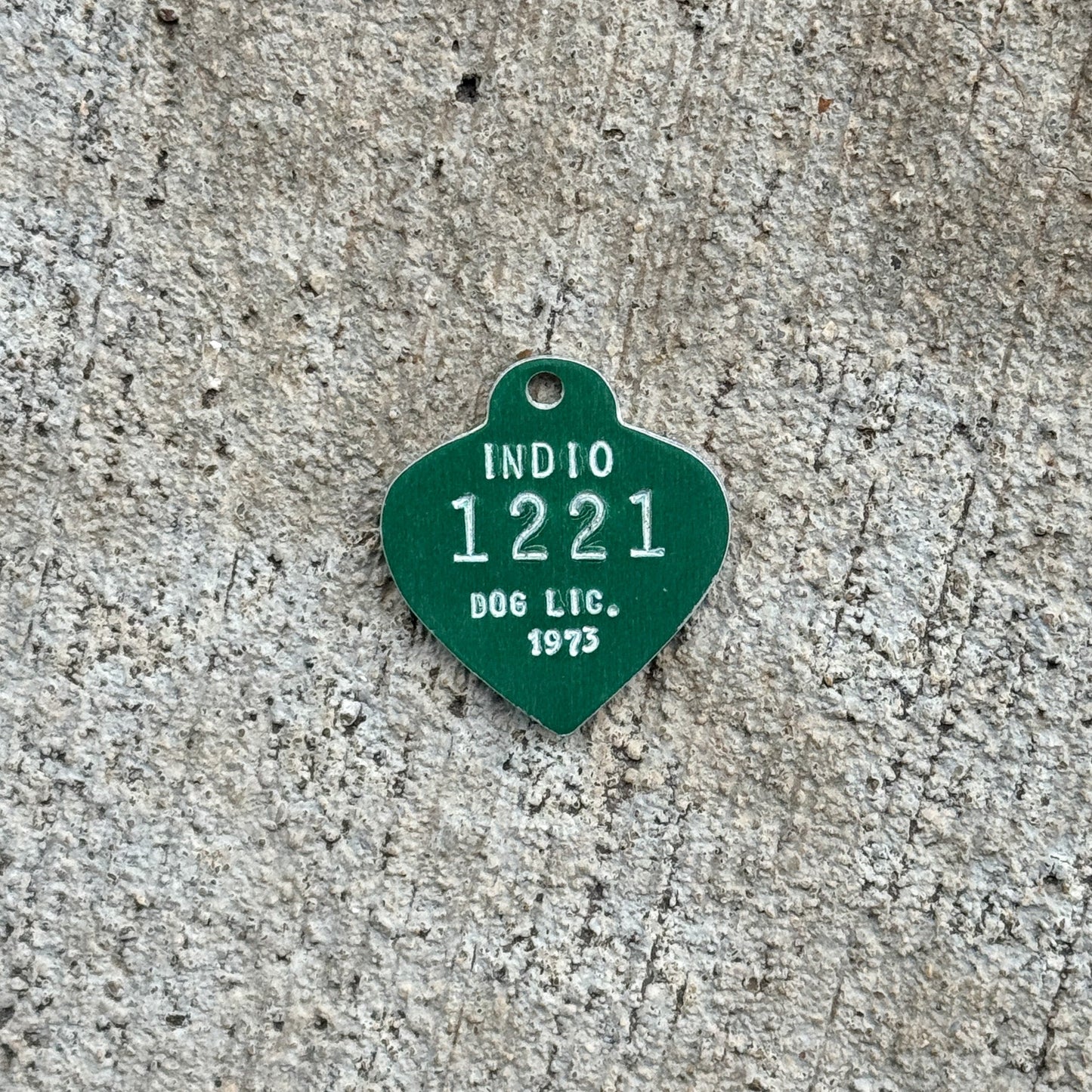 Photo of a 1973 California Dog License Auto Tag Garage Decor Vintage Indio 1221 with original patina