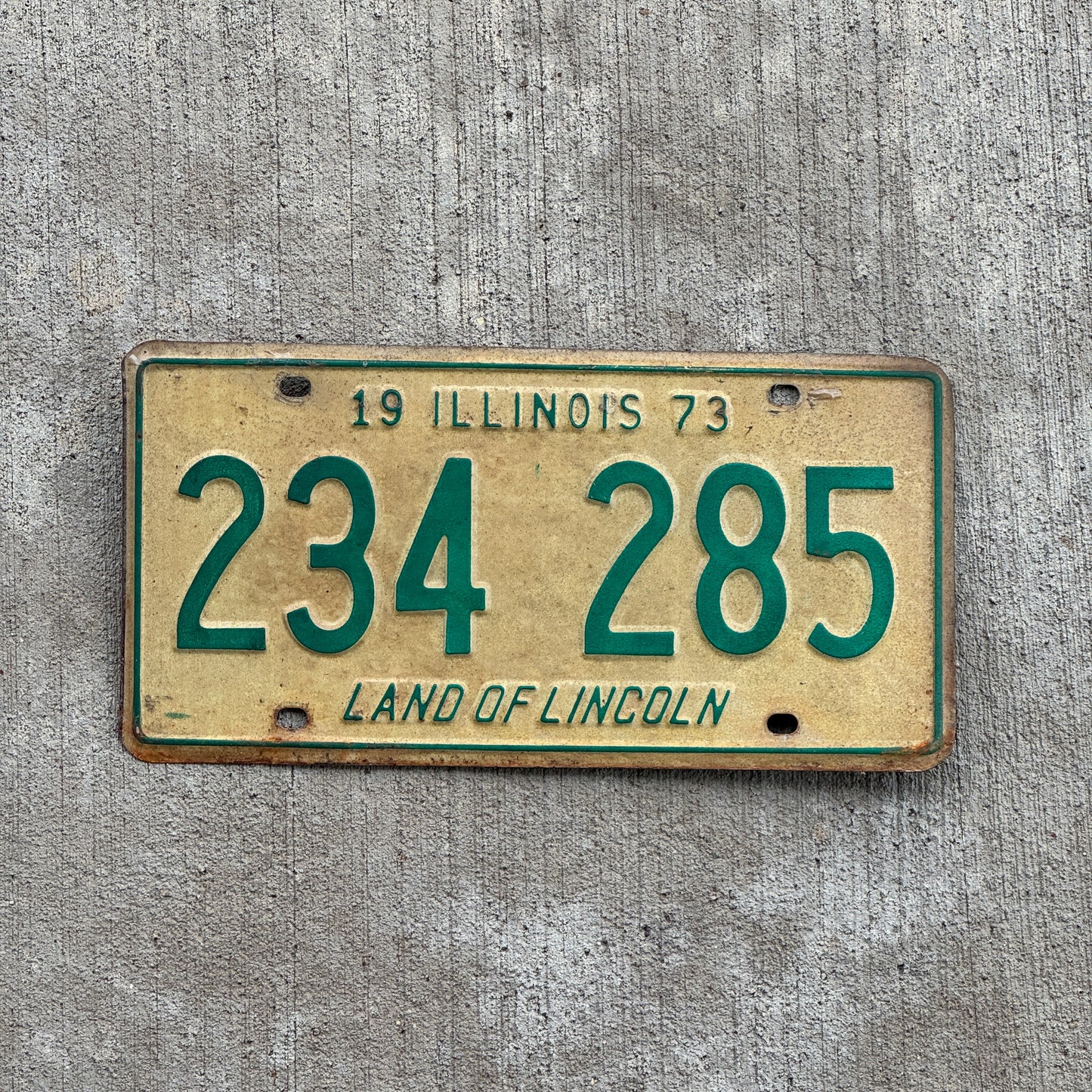 Photo of a 1973 Illinois License Plate Auto Tag 1 Vintage Garage 234 285 with original patina
