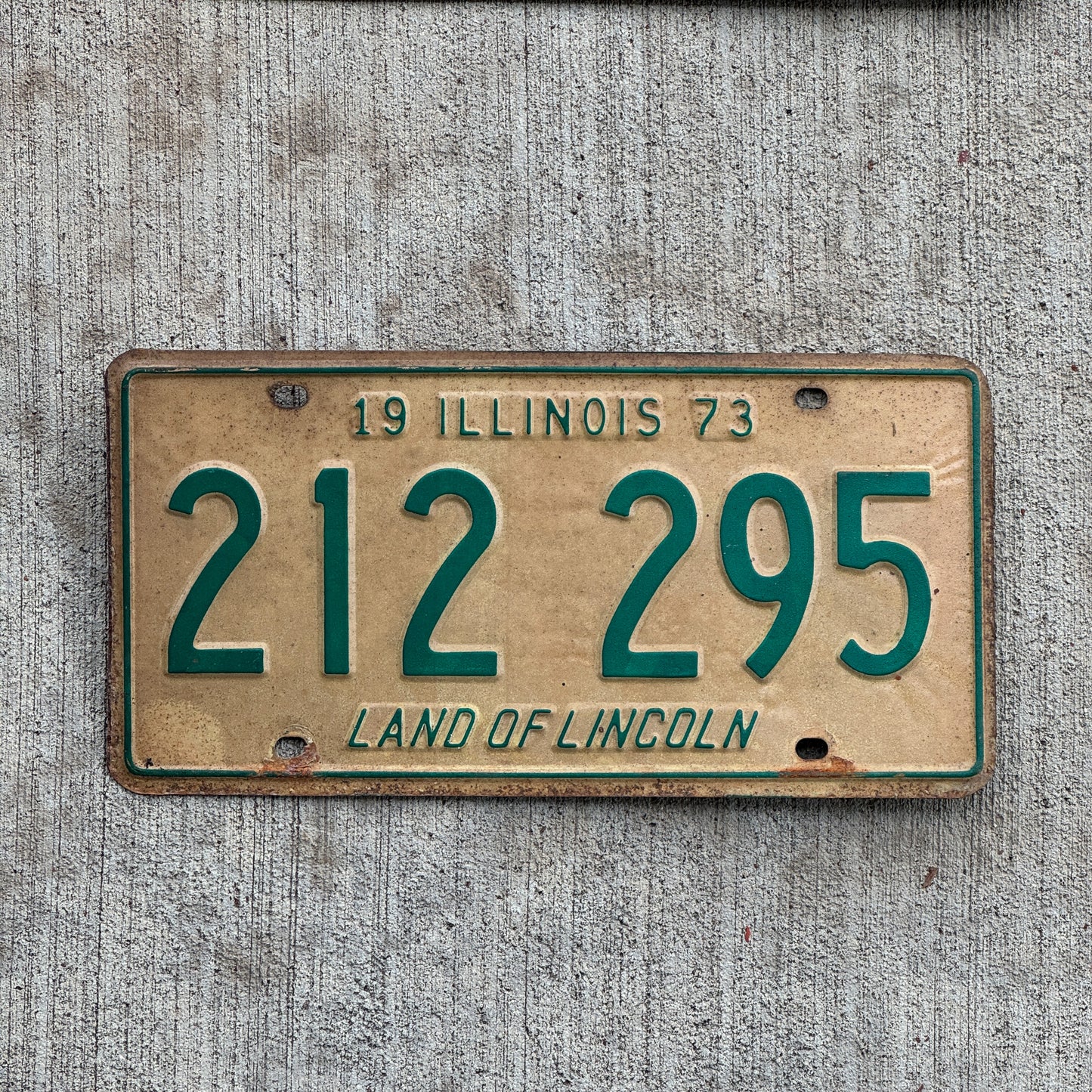 Photo of a 1973 Illinois License Plate Auto Tag 2 Vintage Garage 212 295 with original patina