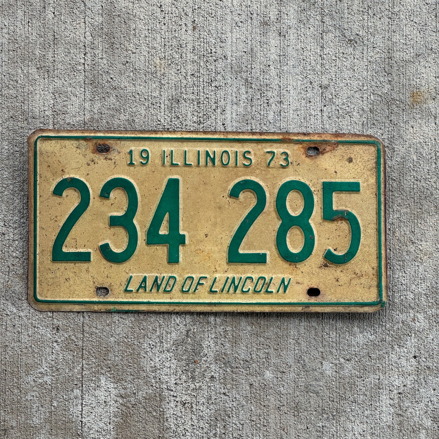 Photo of a 1973 Illinois License Plate Auto Tag 2 Vintage Garage 234 285 with original patina