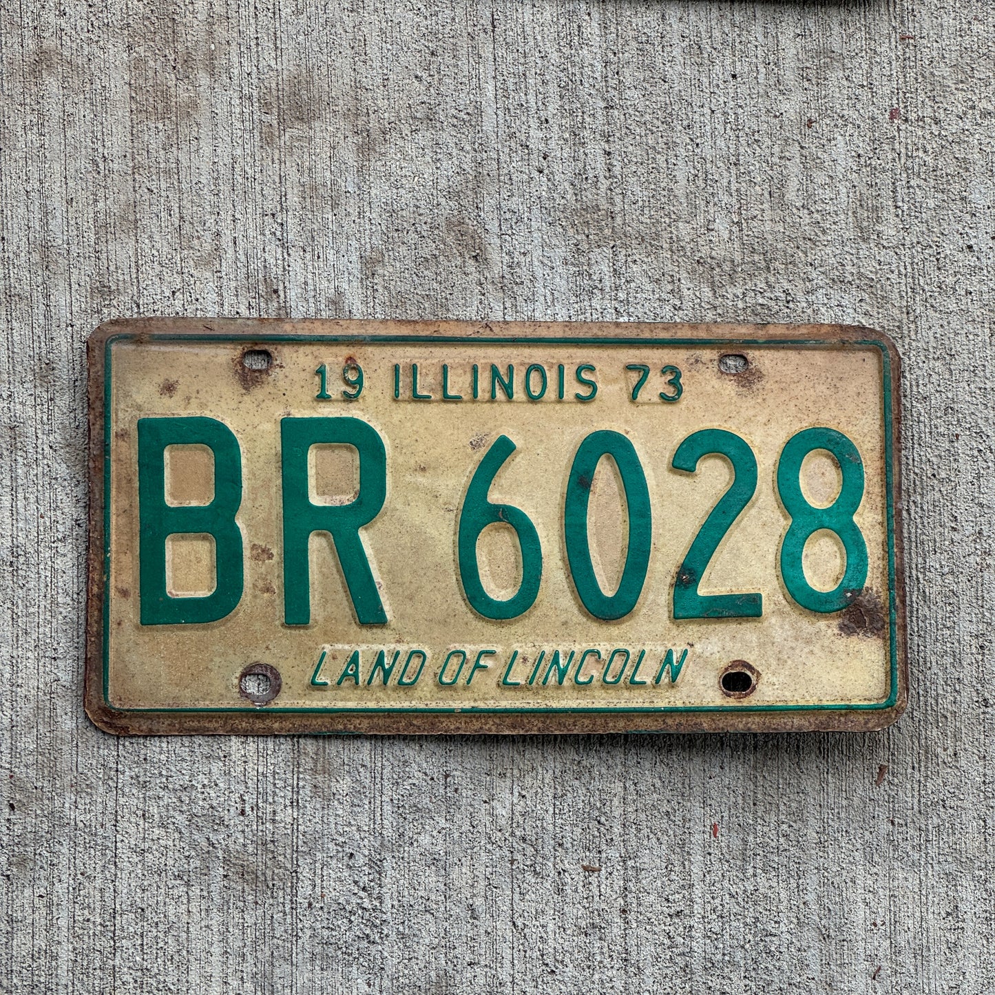 Photo of a 1973 Illinois License Plate Auto Tag 2 Vintage Garage BR 6028 with original patina
