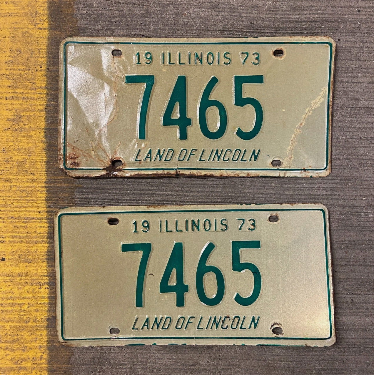 Photo of a 1973 Illinois License Plate Pair Auto Tag Garage Decor Vintage Low Number Four Digit 7465 with original patina