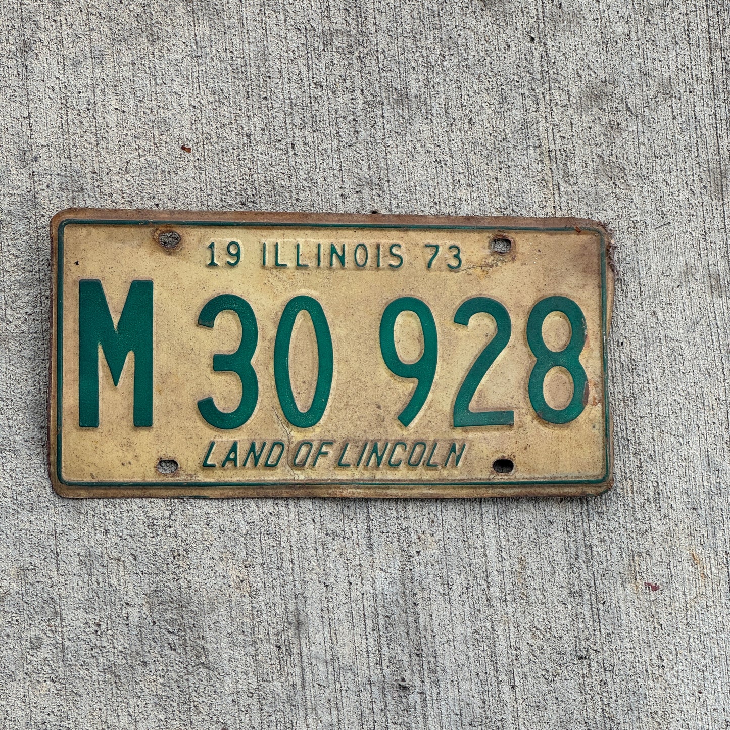 Photo of a 1973 Illinois Municipal License Plate Auto Tag Garage Decor Vintage M 30 928 with original patina