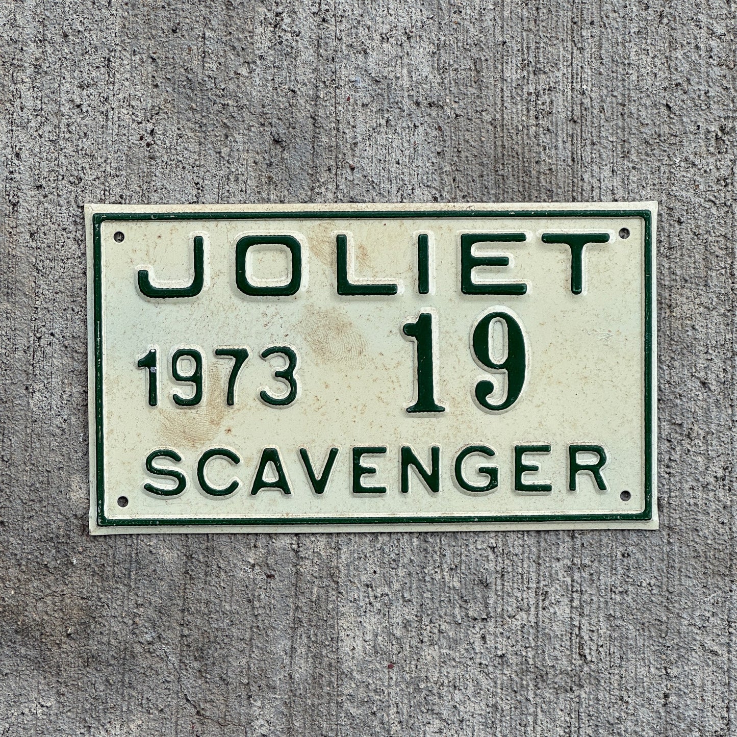 Photo of a 1973 Illinois Scavenger License Plate Auto Tag Garage Decor Vintage Joliet 19 with original patina