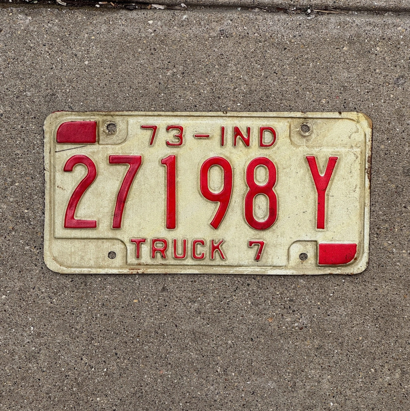 Photo of a 1973 Indiana Truck License Plate Auto Tag Garage Decor 27198 Y