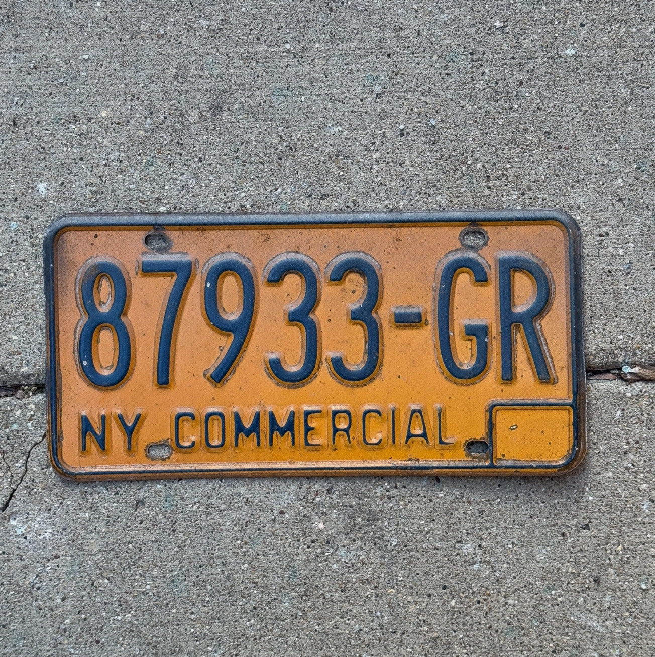 Photo of a 1973 New York Commercial License Plate Auto Tag Garage Decor Vintage 87933 GR