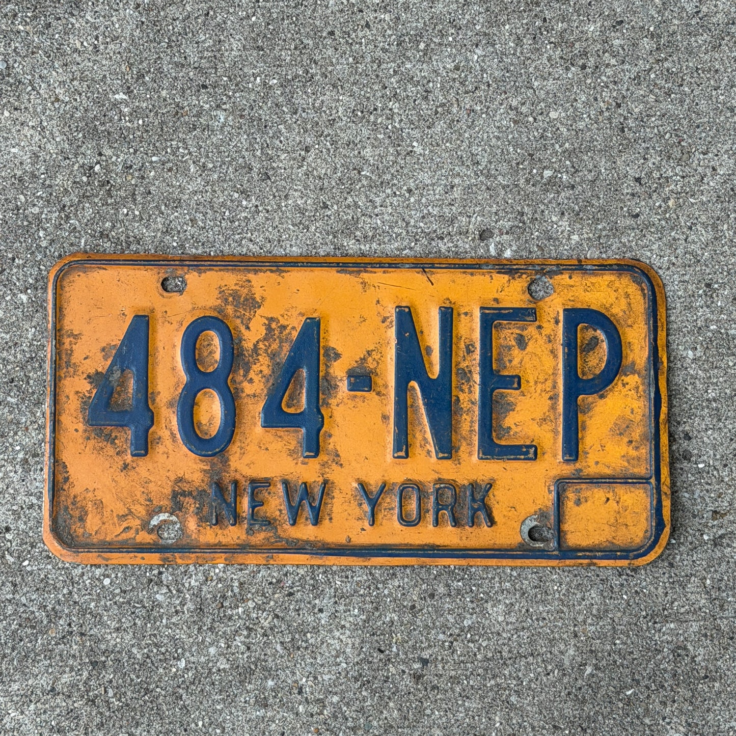 Photo of a 1973 New York License Plate Auto Tag Garage Decor Vintage 484 NEP with original patina