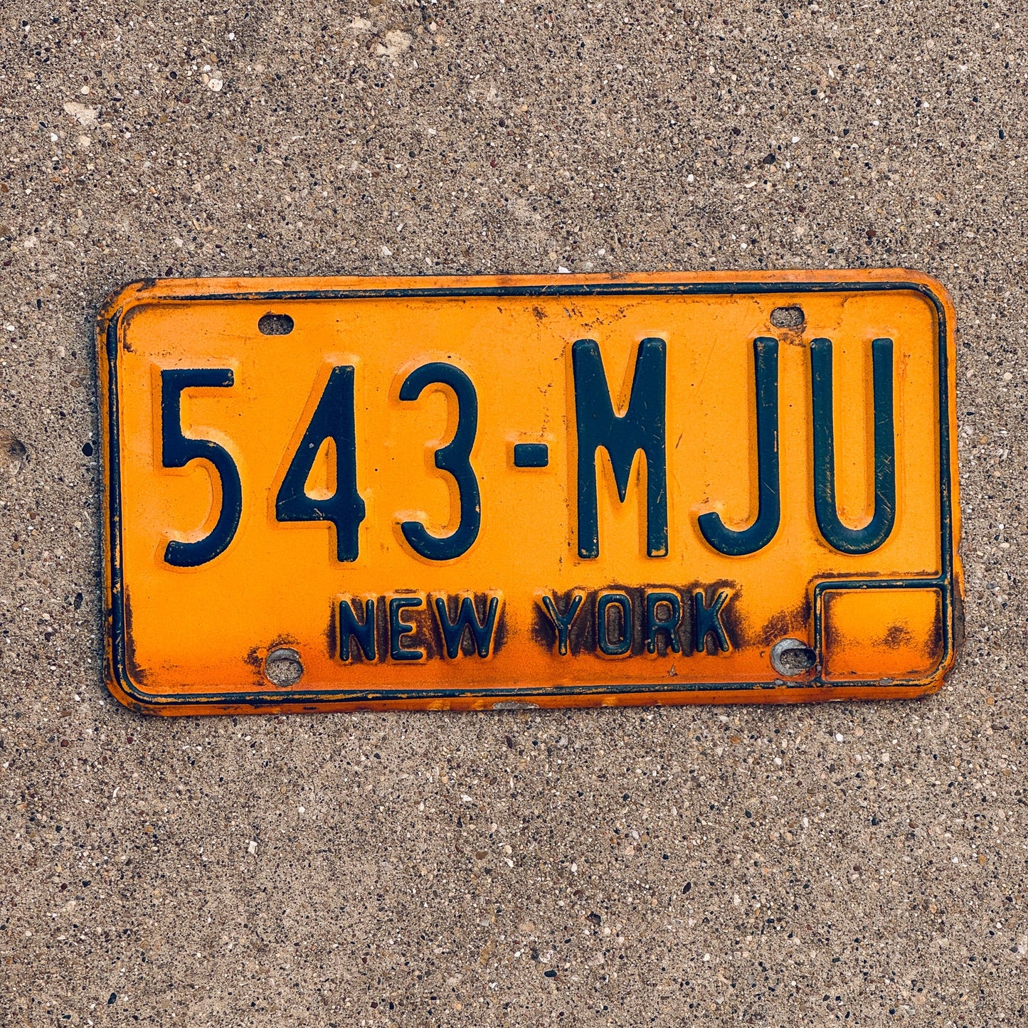 Photo of a 1973 New York License Plate Auto Tag Garage Decor Vintage 543 MJU