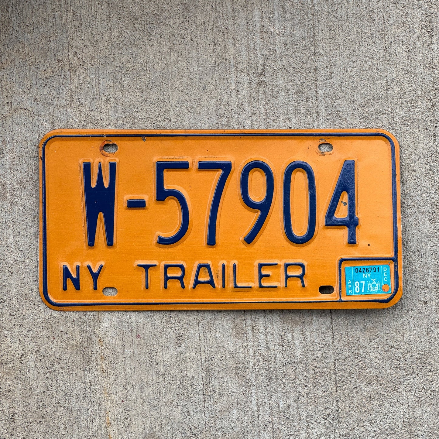 Photo of a 1973 New York TRAILER License Plate Auto Tag Garage Decor Vintage W 57904