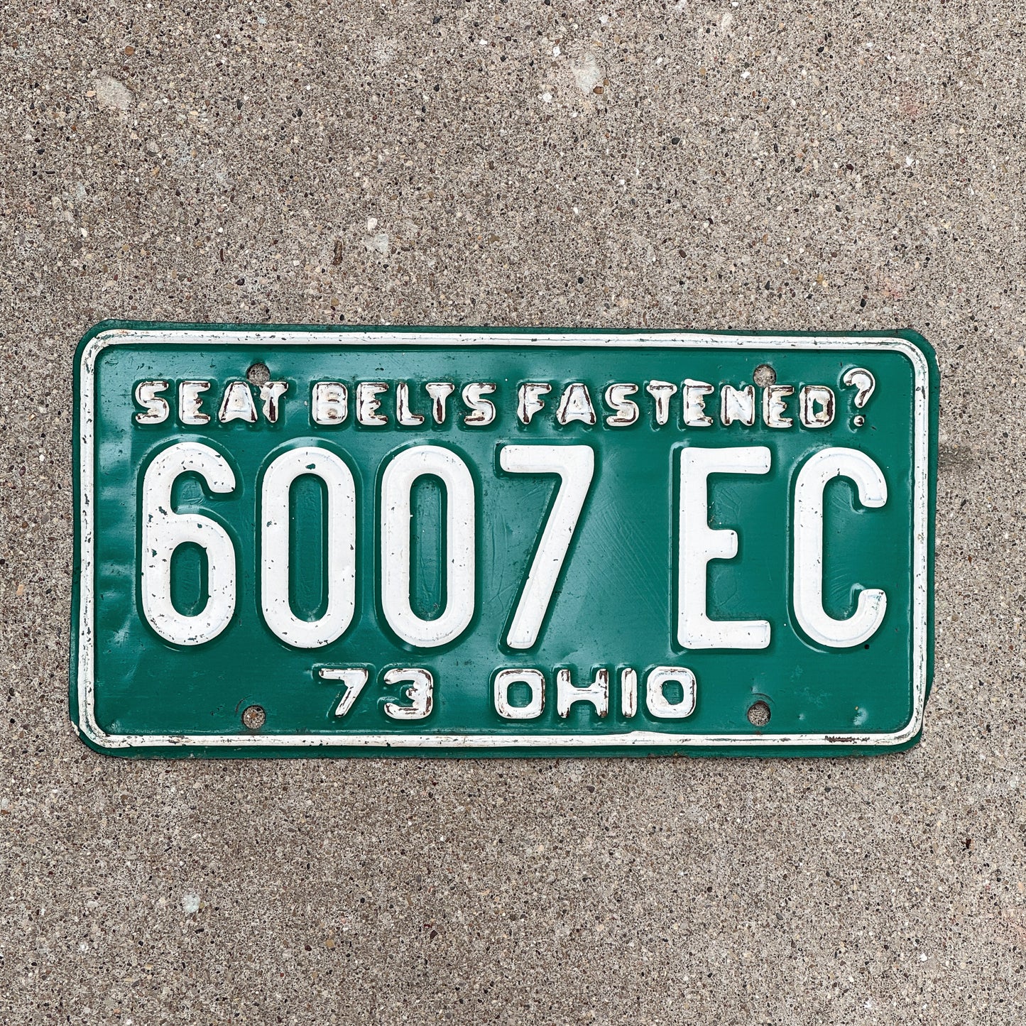 Photo of a 1973 Ohio License Plate Auto Tag Garage Decor Vintage 6007 EC with original patina