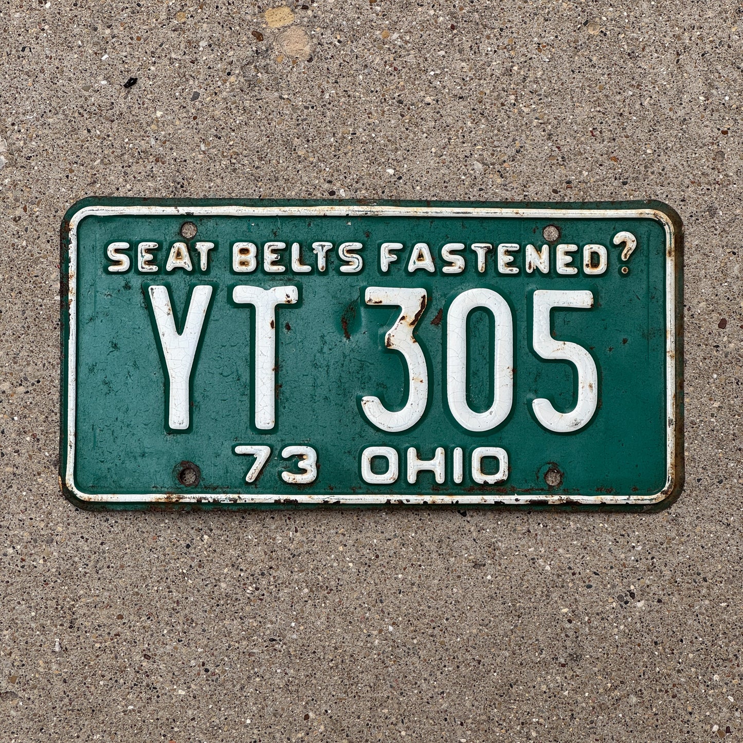 Photo of a 1973 Ohio License Plate Auto Tag Garage Decor Vintage YT 305 with original patina