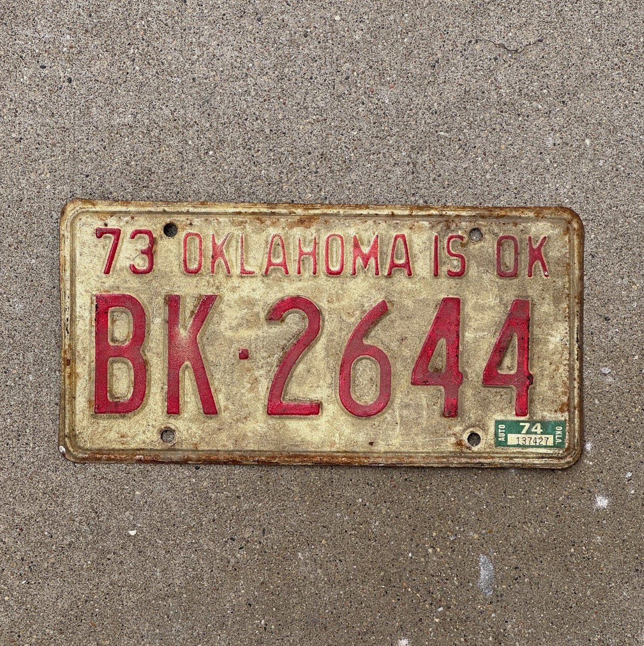 Photo of a 1973 Oklahoma License Plate Auto Tag Garage Decor Vintage BK 2644